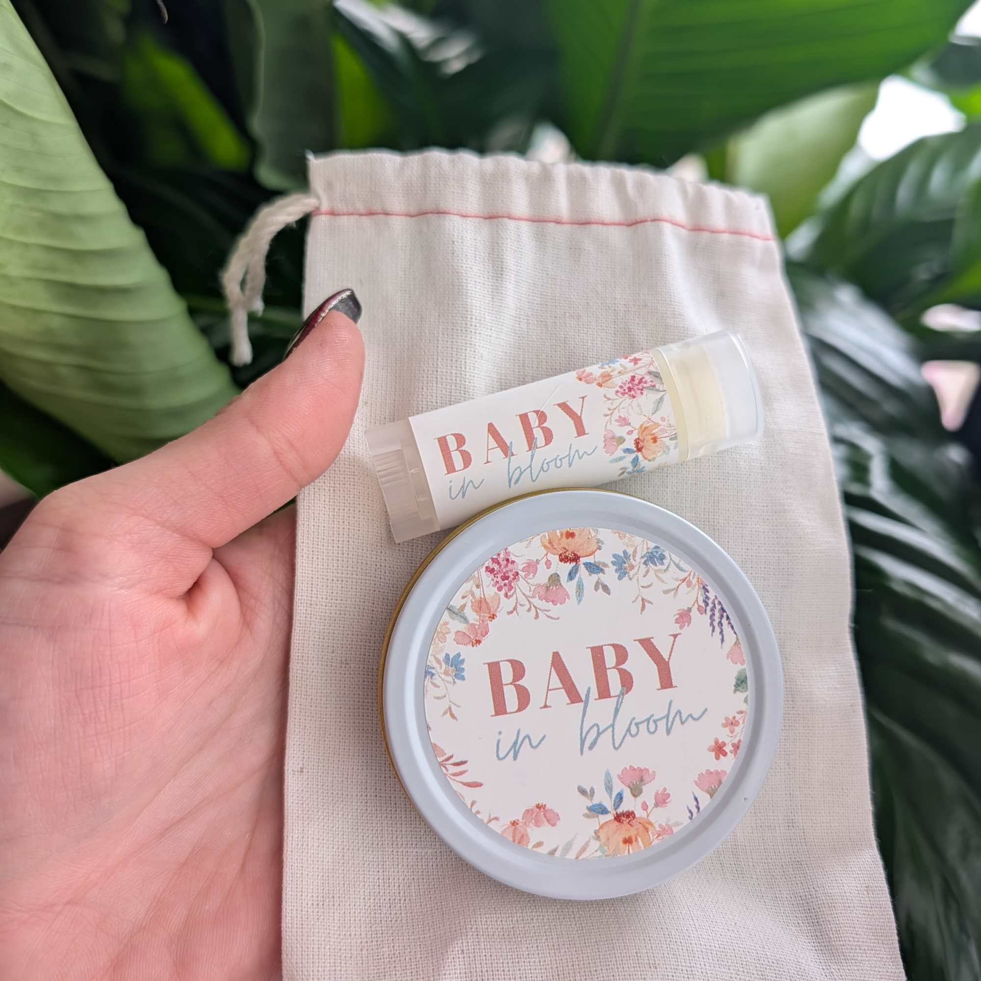 Baby in bloom lip balm and tin in a small drawstring pouch