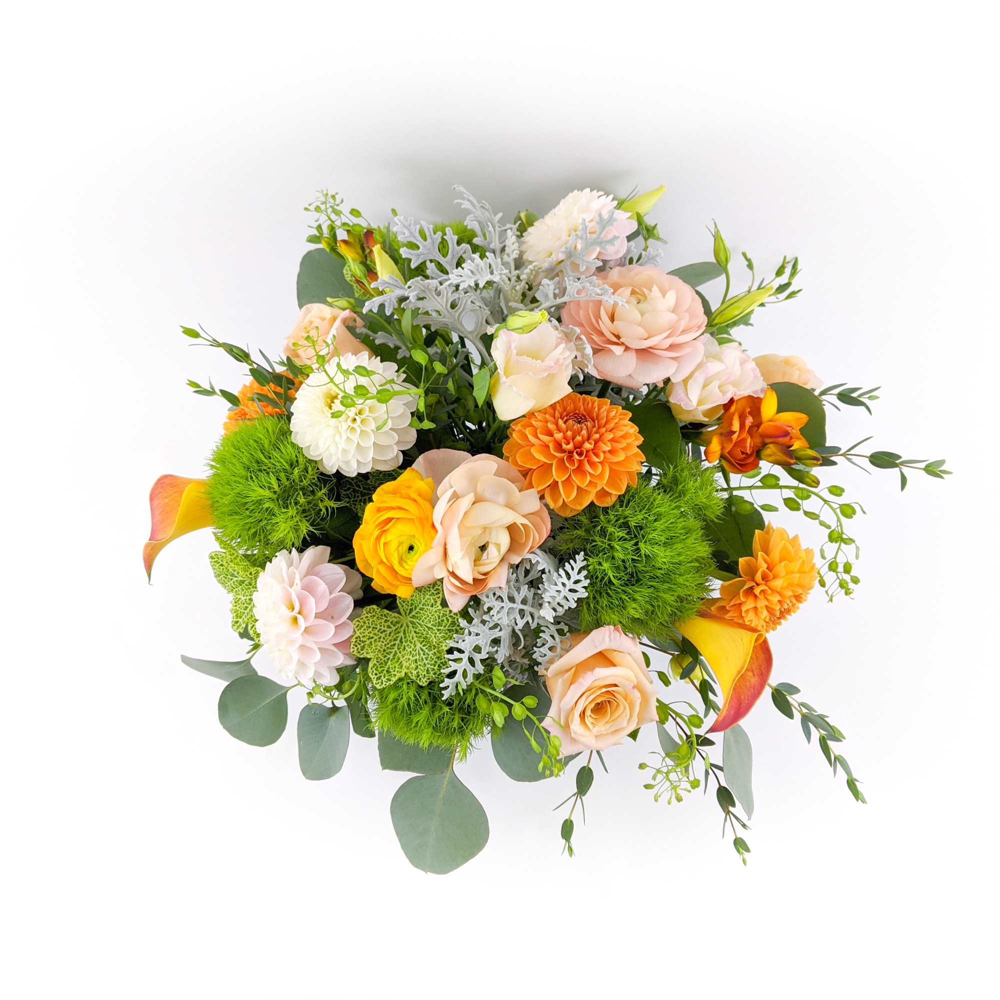 Mixed bouquet with peach, orange, white, and yellow flowers