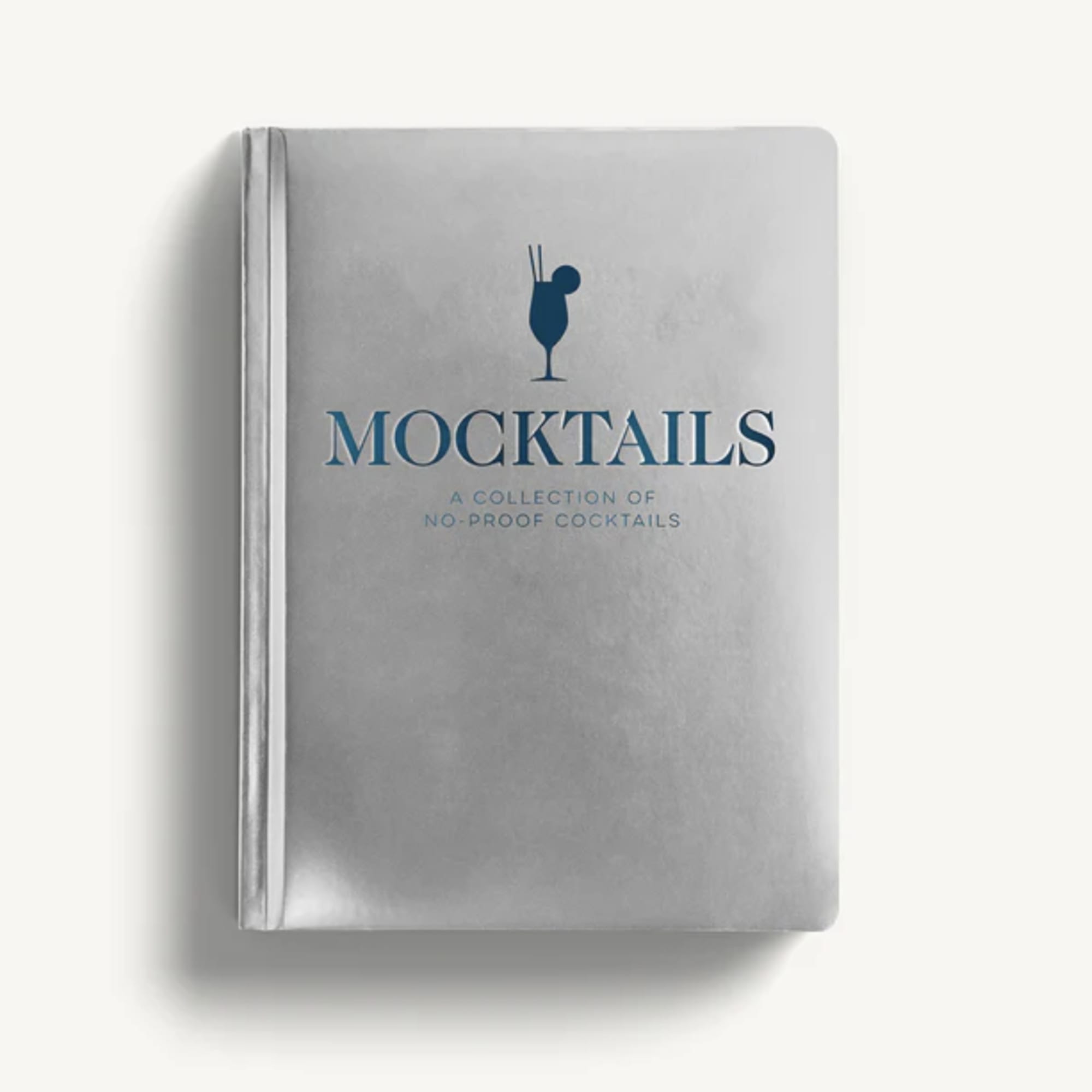 Silver book titled "Mocktails" with a cocktail glass icon