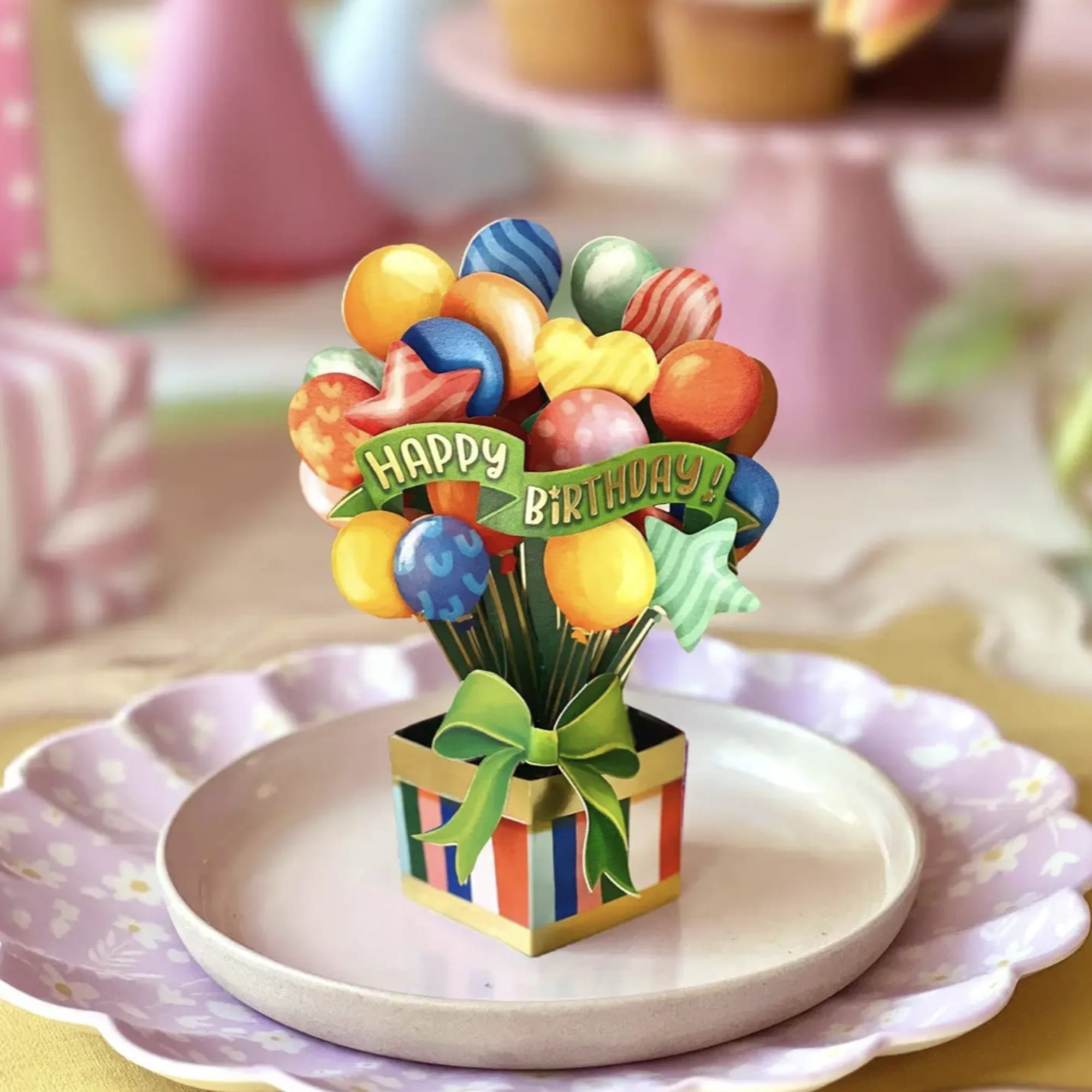 Mini birthday balloon bouquet in a striped gift box