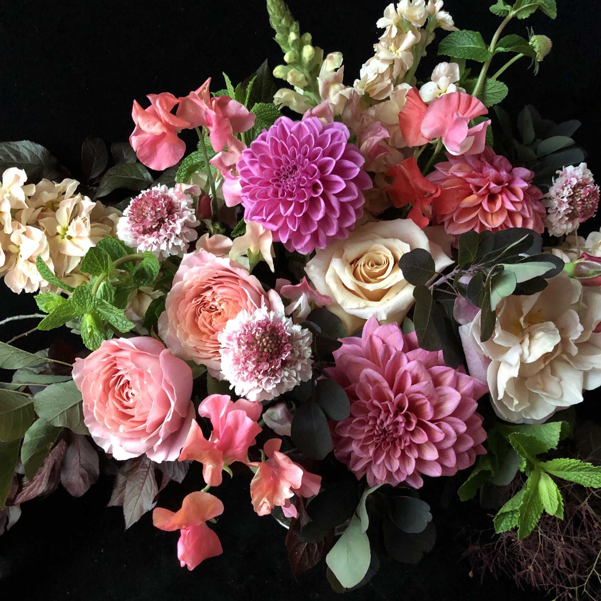 Pink and cream mixed bouquet with dahlias, roses, and snapdragons