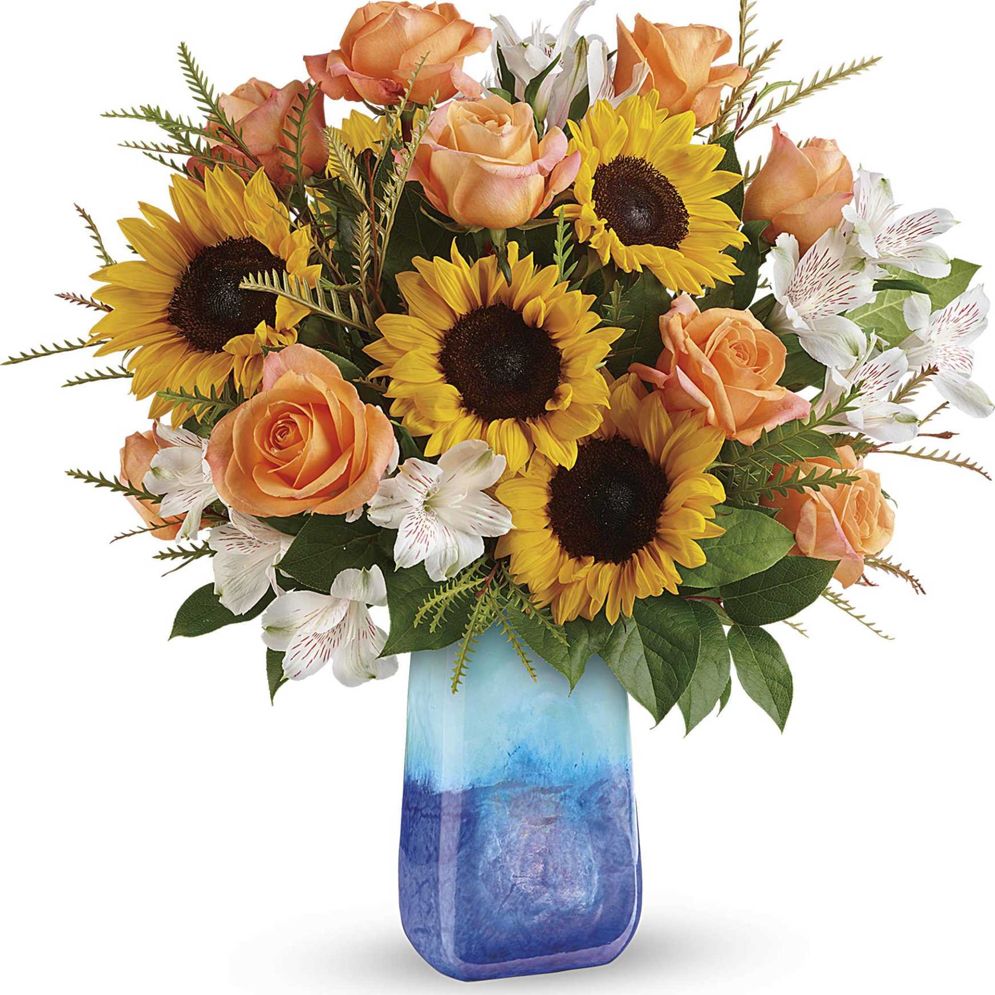 Bouquet of sunflowers, peach roses, and white alstroemeria in a blue vase