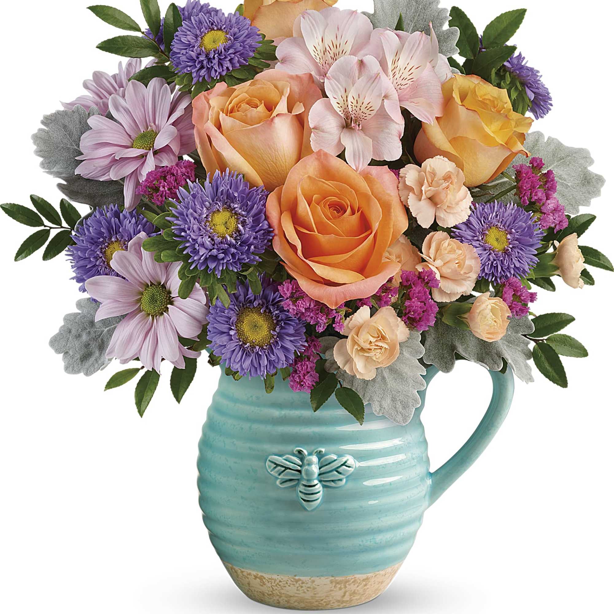 Bouquet of orange roses, pink alstroemeria, and purple daisies in a turquoise pitcher
