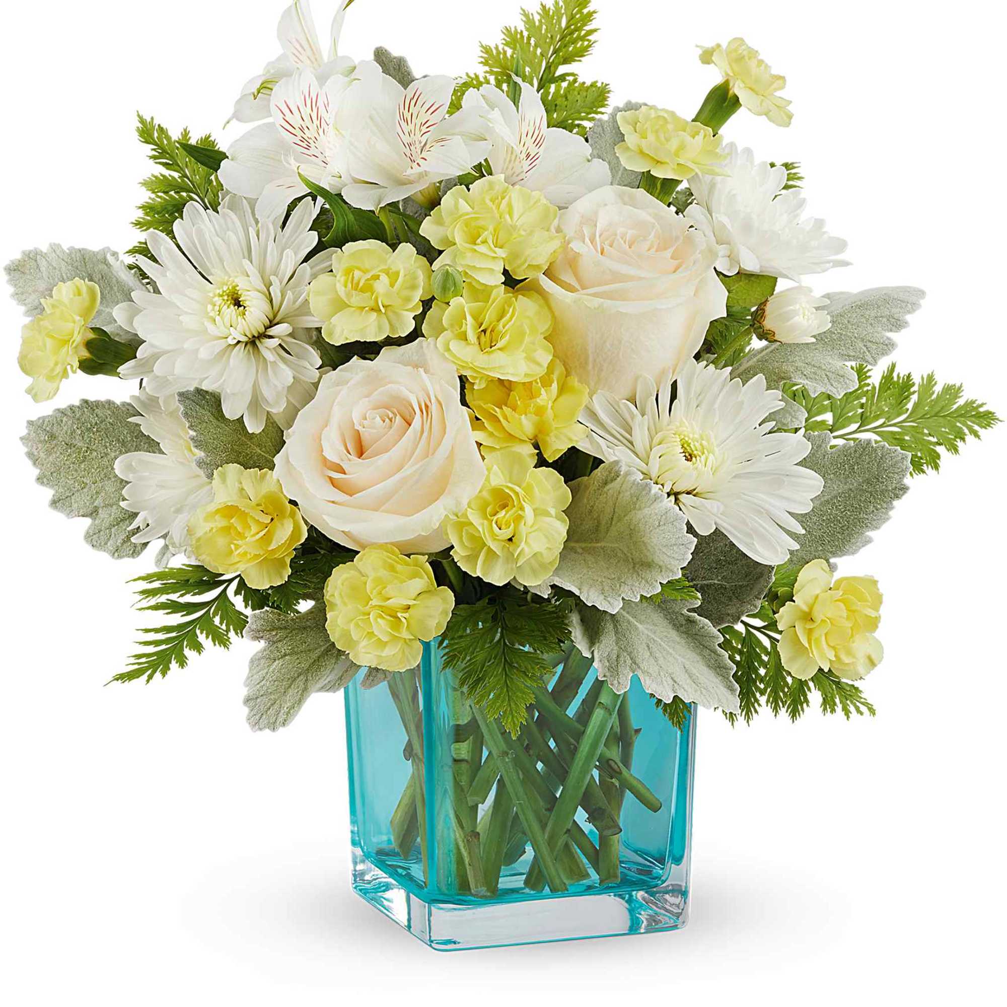White and pale yellow bouquet in a blue glass vase