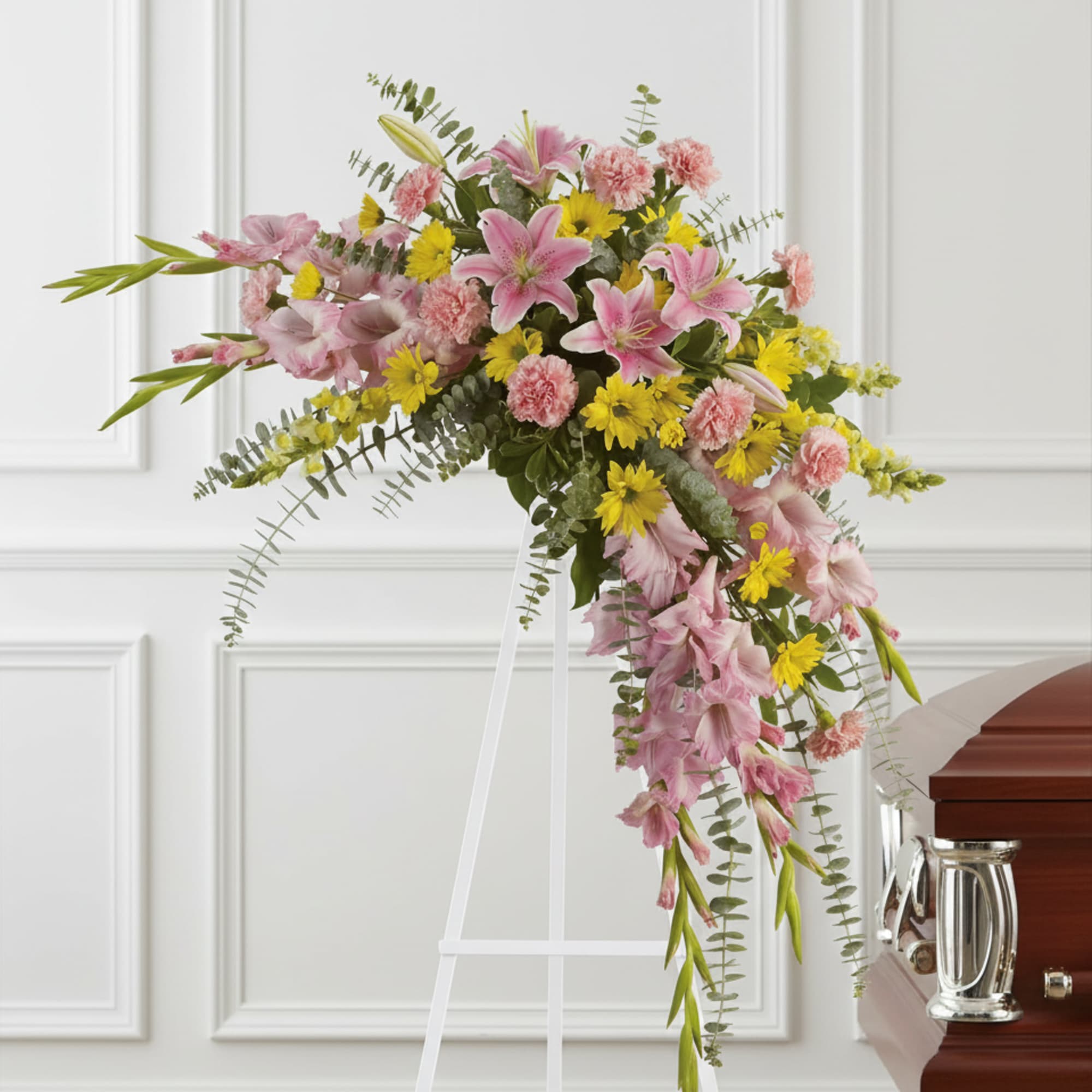 Rejoice with this softly dramatic cascade of pink and yellow blooms -