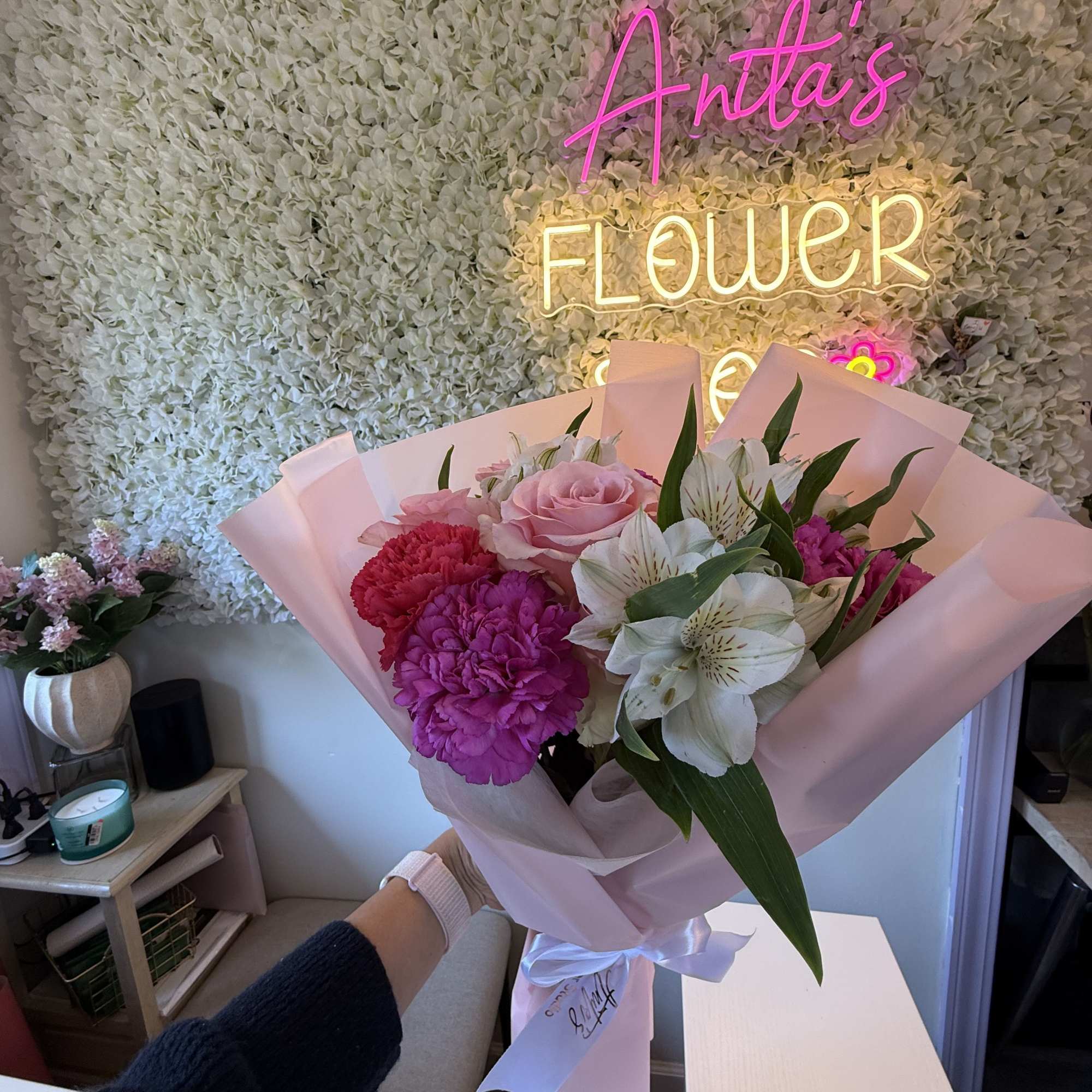 Pink and white bouquet with roses, carnations, and alstroemeria