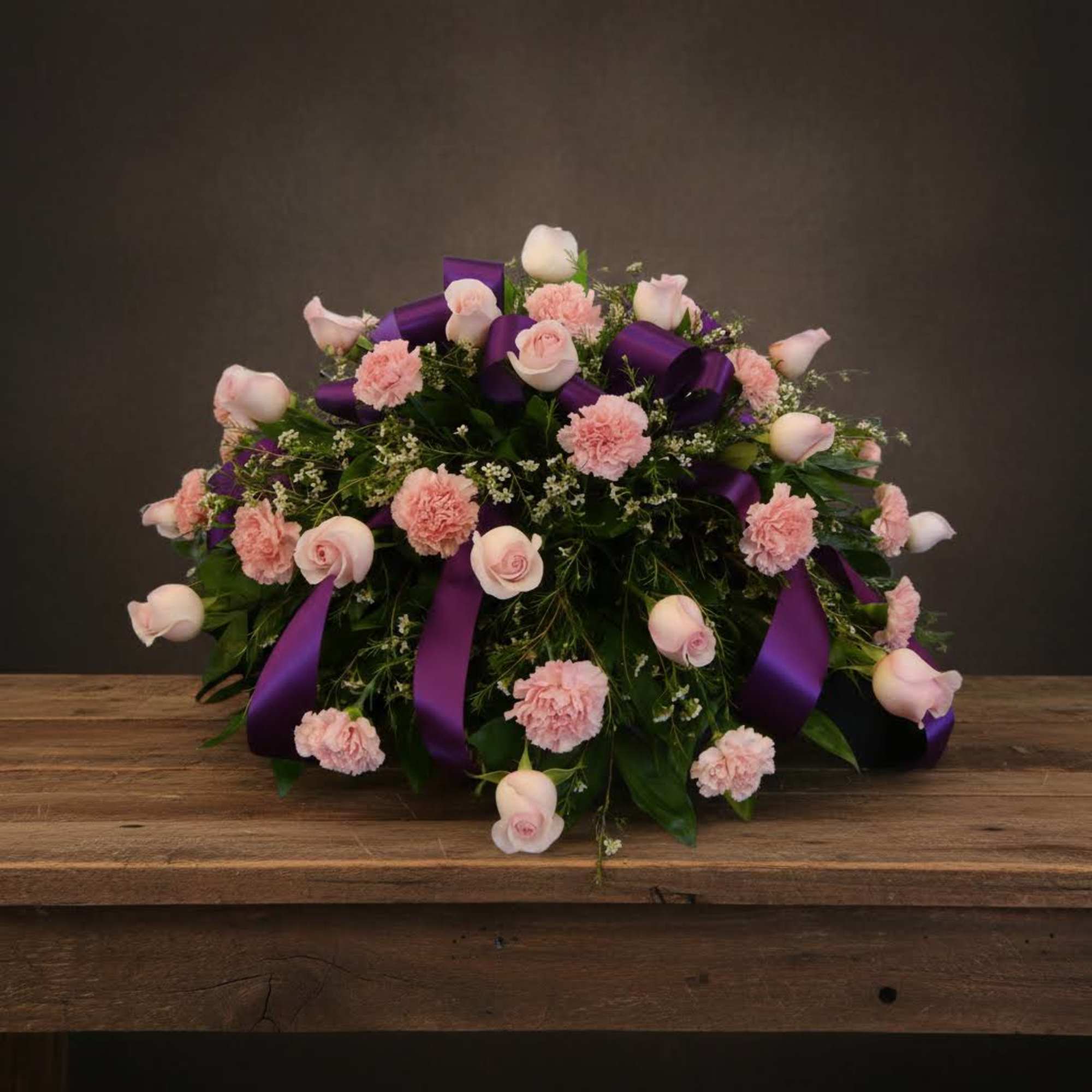 Casket Cover in Pinks With Purple Ribbon