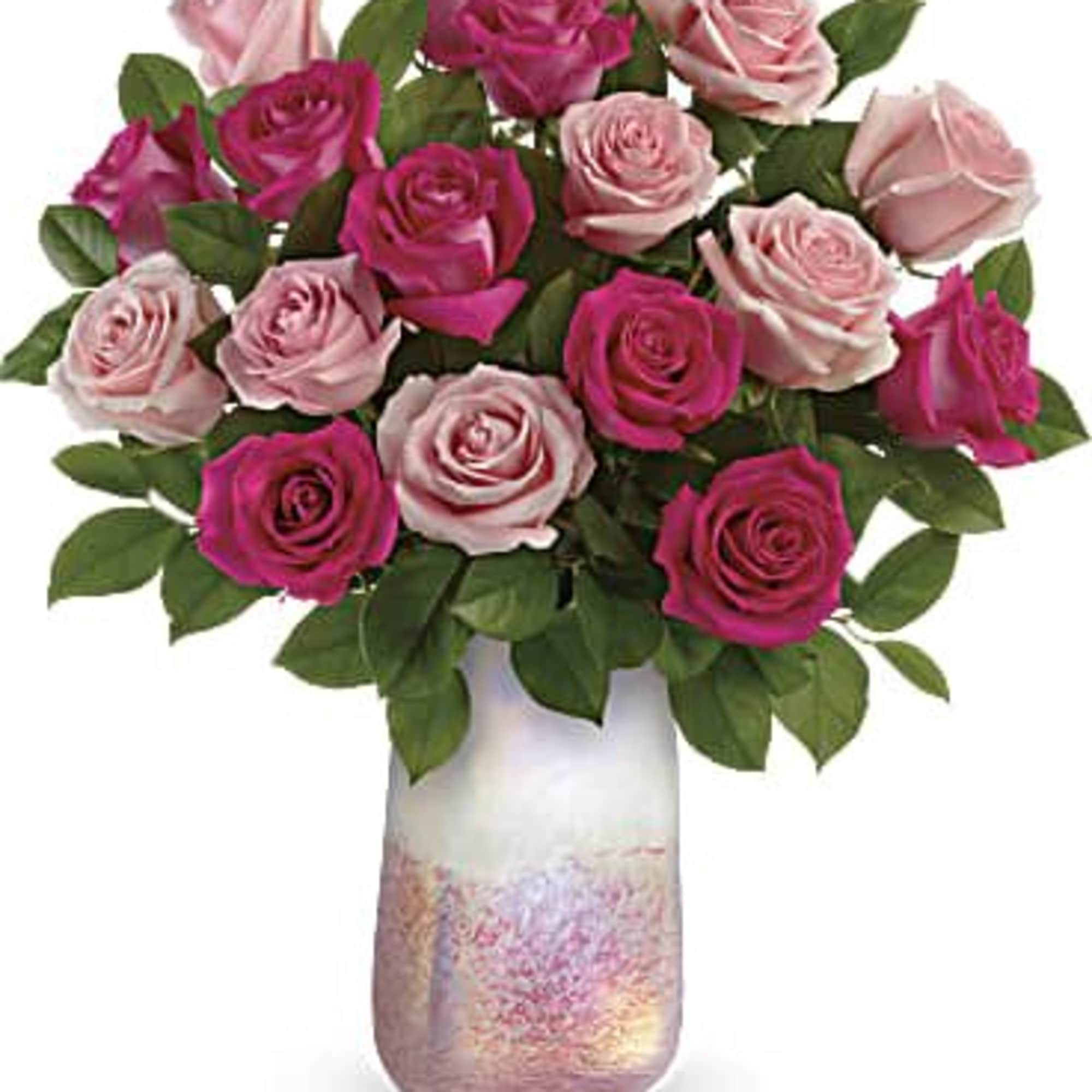 Pink and blush roses arranged in a decorative vase