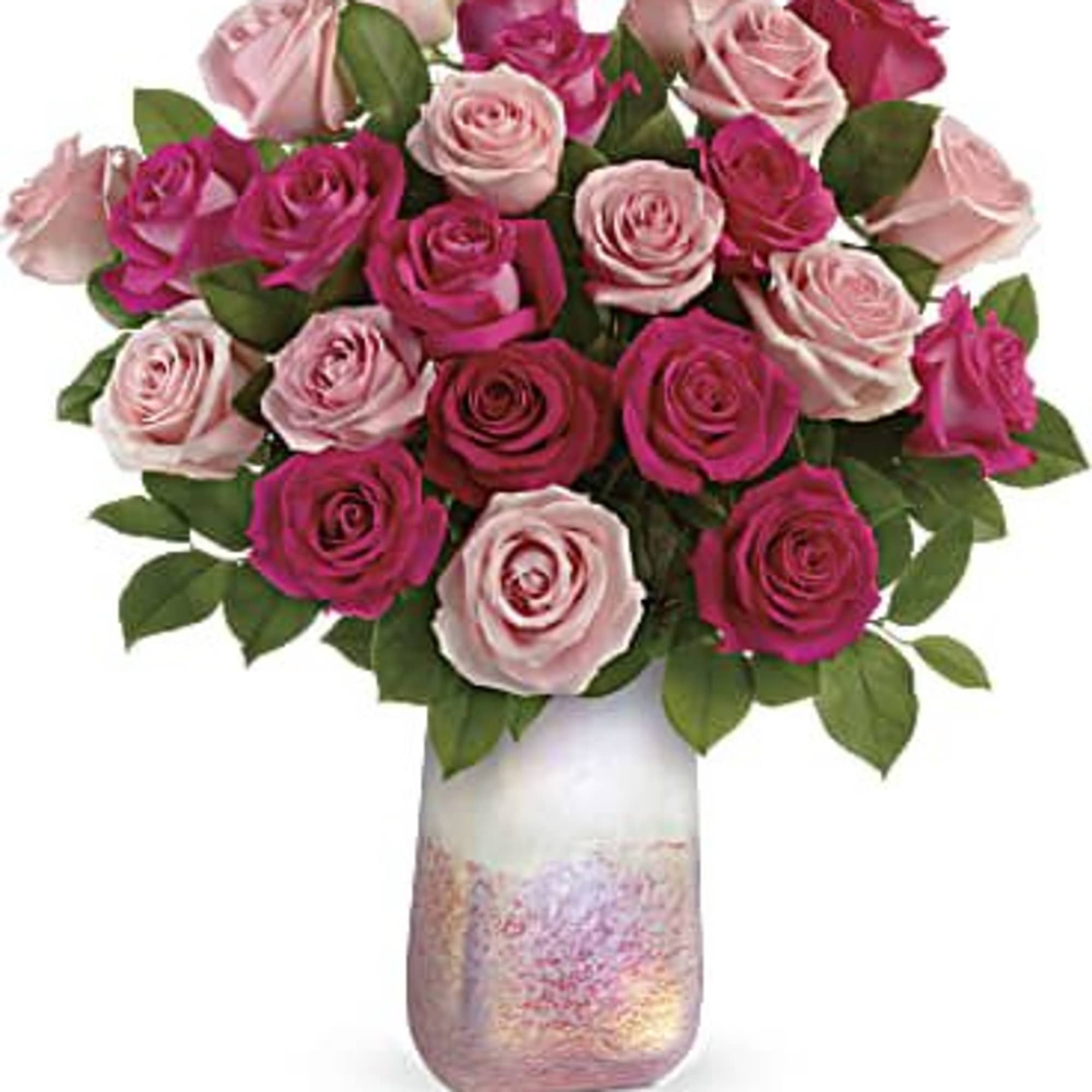 Bouquet of pink and magenta roses in a decorative vase