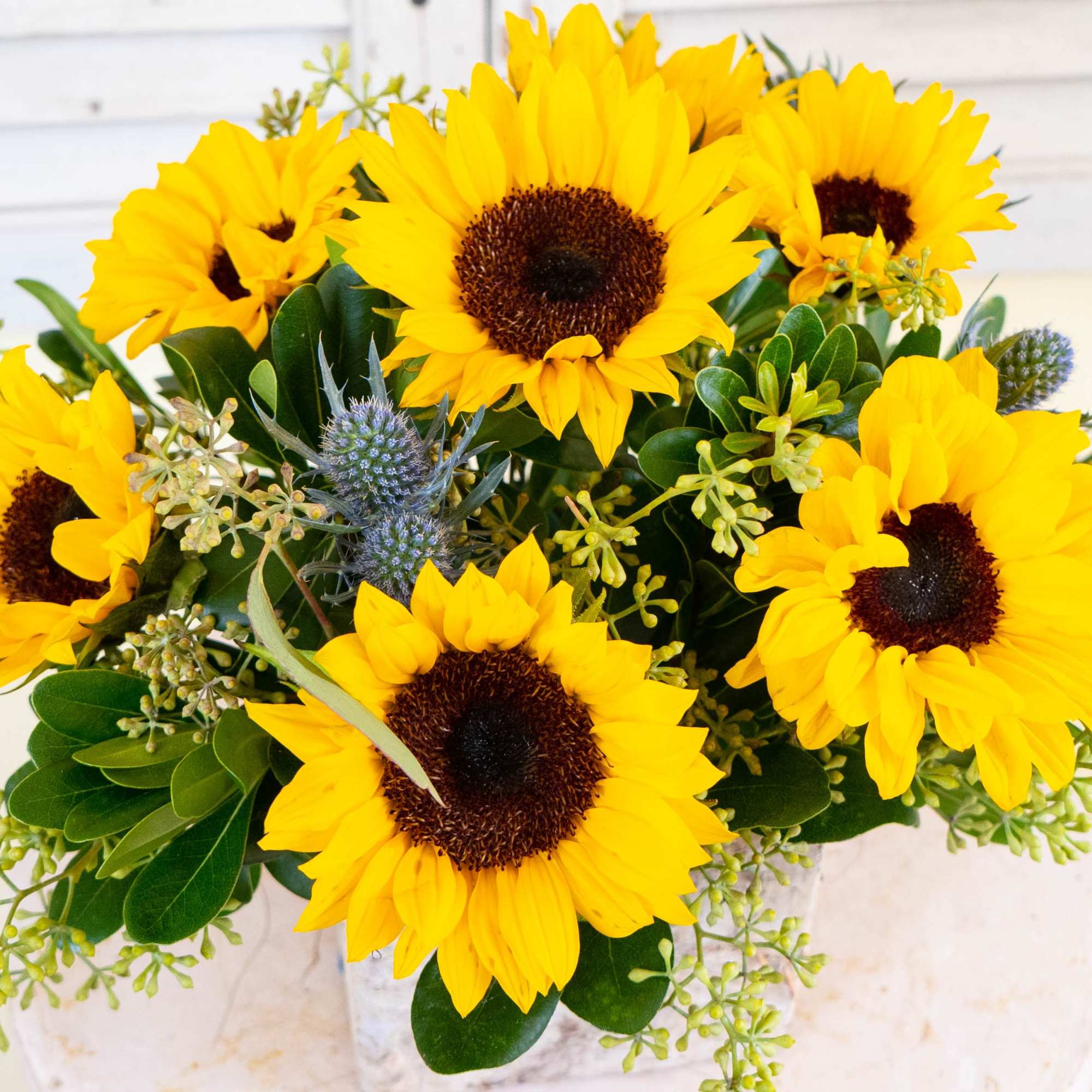 A cheerful arrangement of fresh, vibrant sunflowers perfect to make anyone's day!, photo 2 of 3