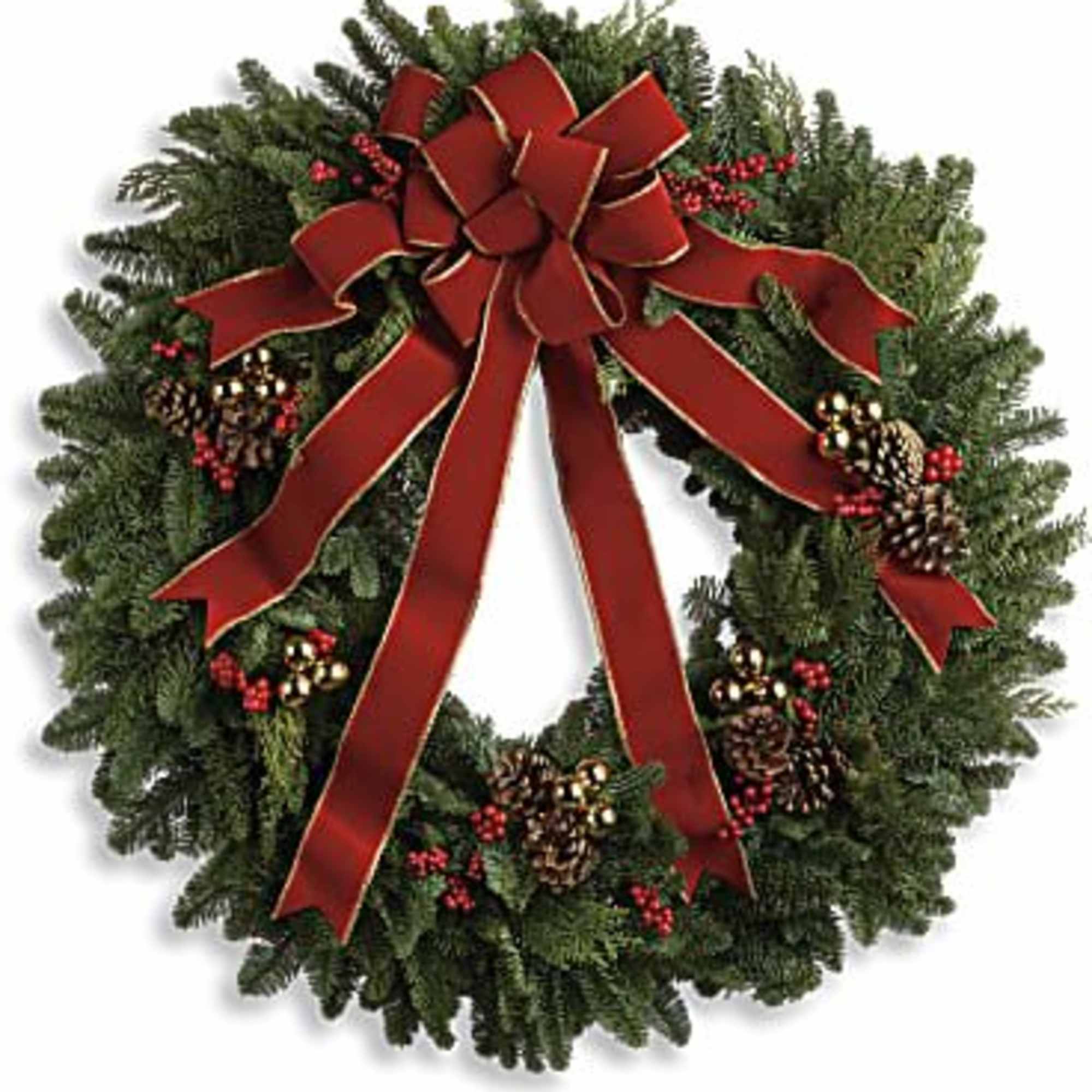 Christmas wreath with a red bow and pinecones