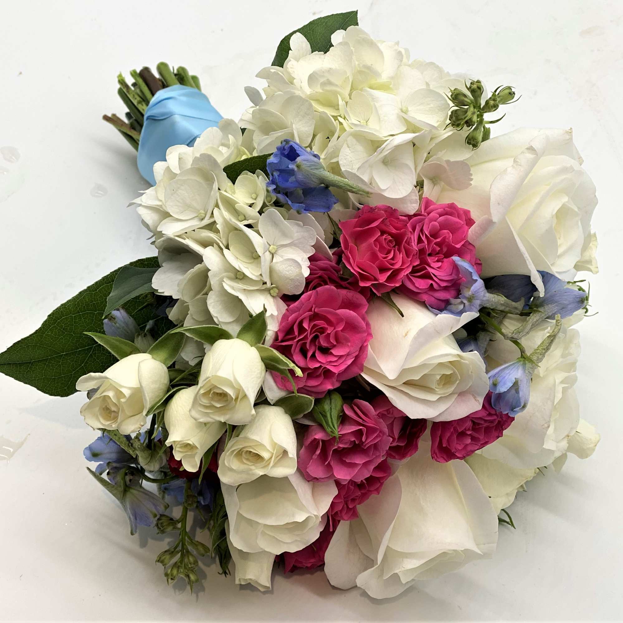 A mix of mostly white flowers with pops of hot pink and, photo 2 of 3