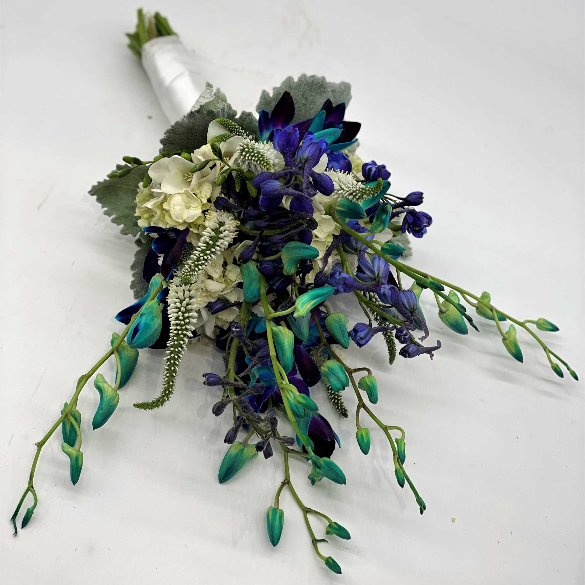 A fun mix of blue orchids, white veronica and blue delphinium sets, photo 3 of 3
