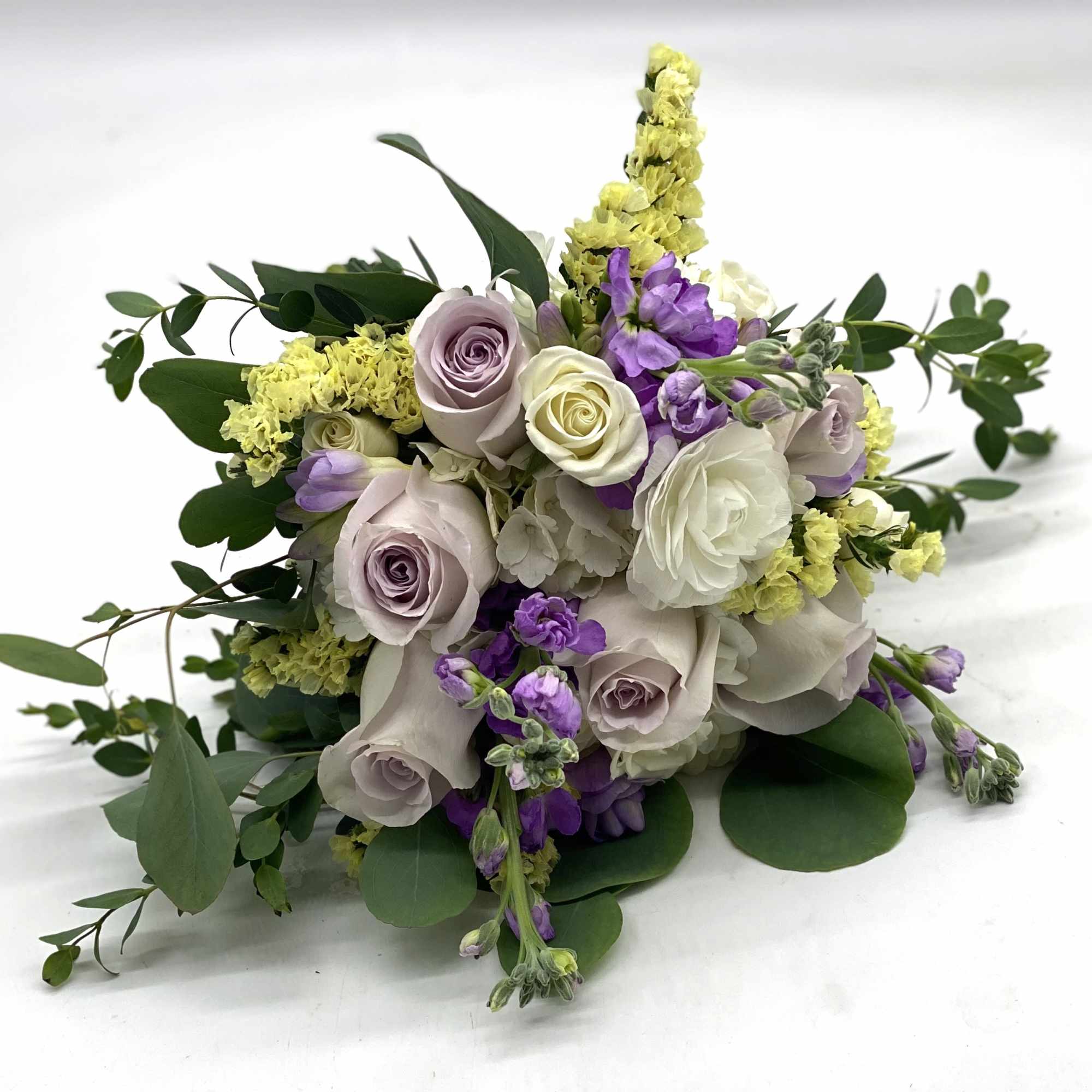 White Hydrangea, Lavender Rose, White Spray Roses, Pale Yellow Statice finished off, photo 3 of 3