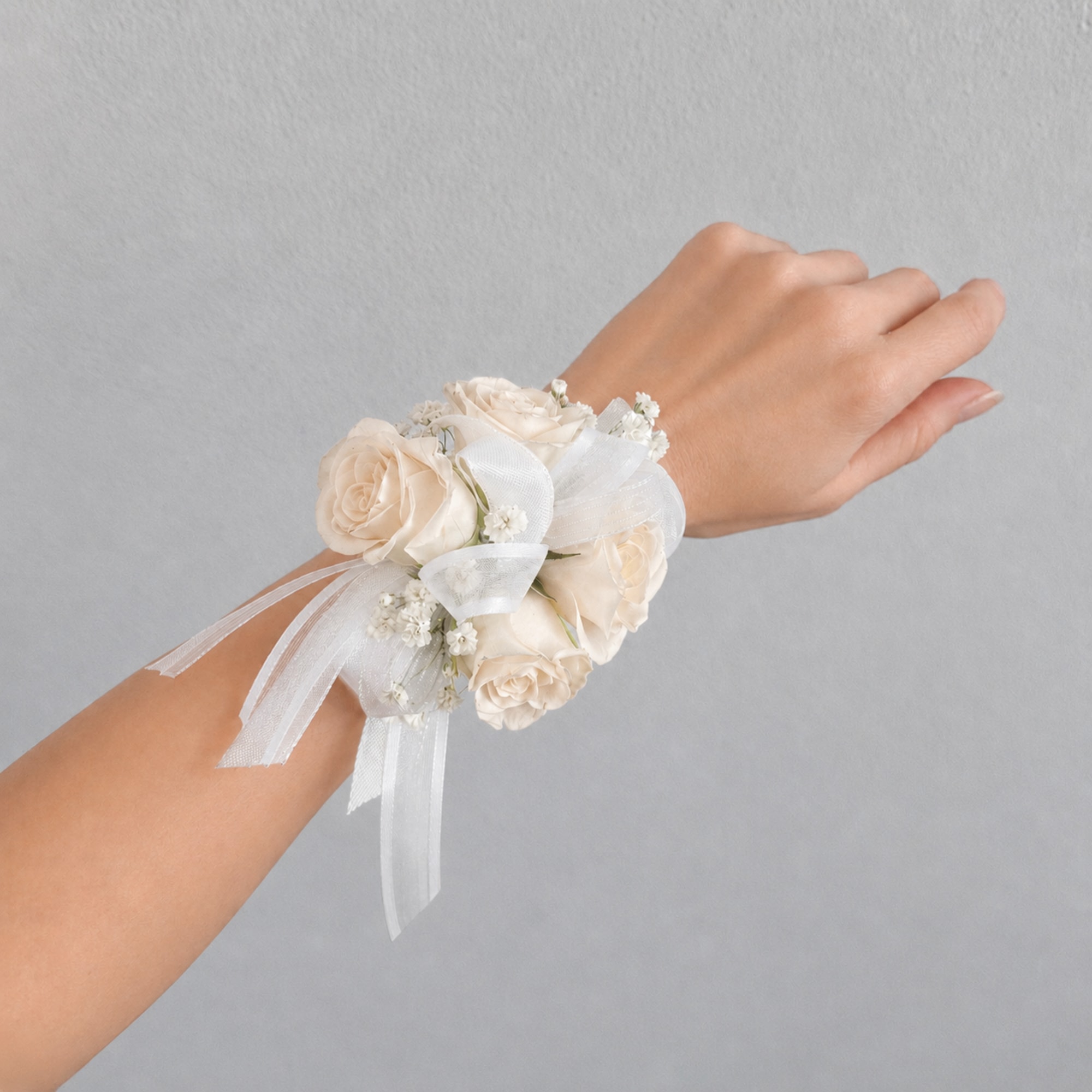 White rose wrist corsage with ribbon ties