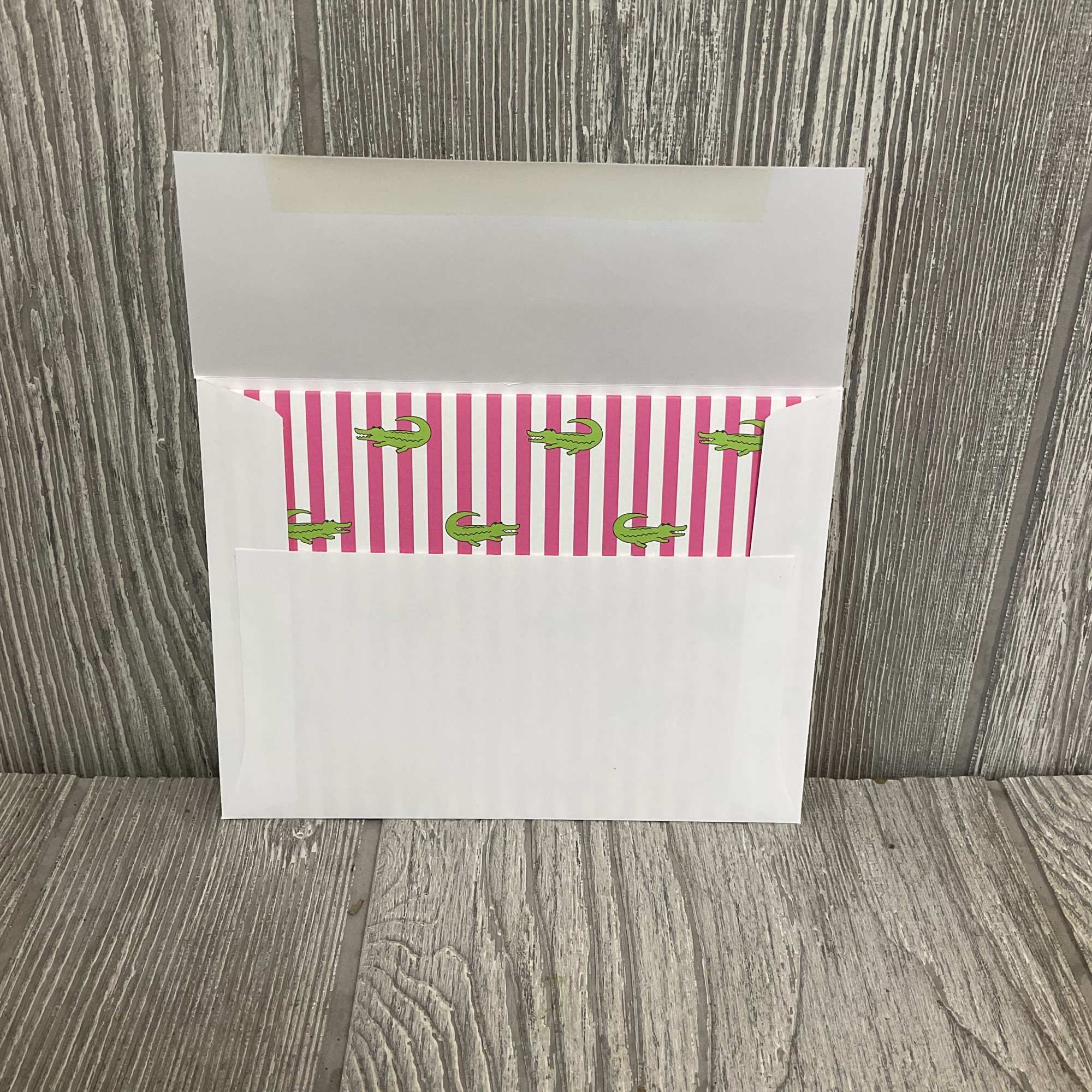 Bright pink-and-white vertical stripes meet cute green alligators in a boxed set, photo 3 of 3