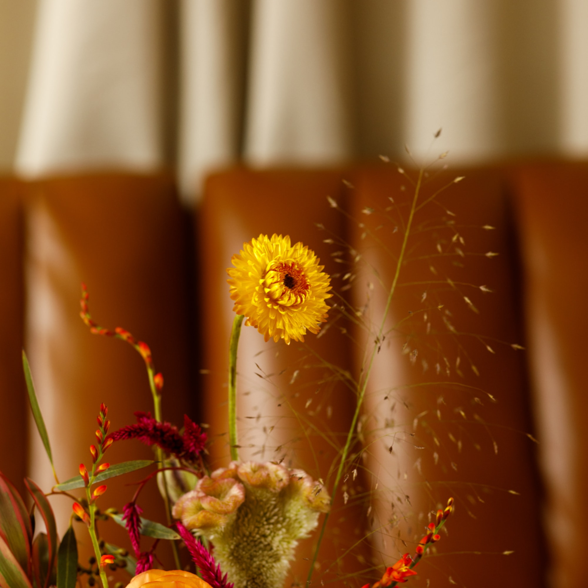 Mixed bouquet with a bright yellow bloom and pink-orange flowers