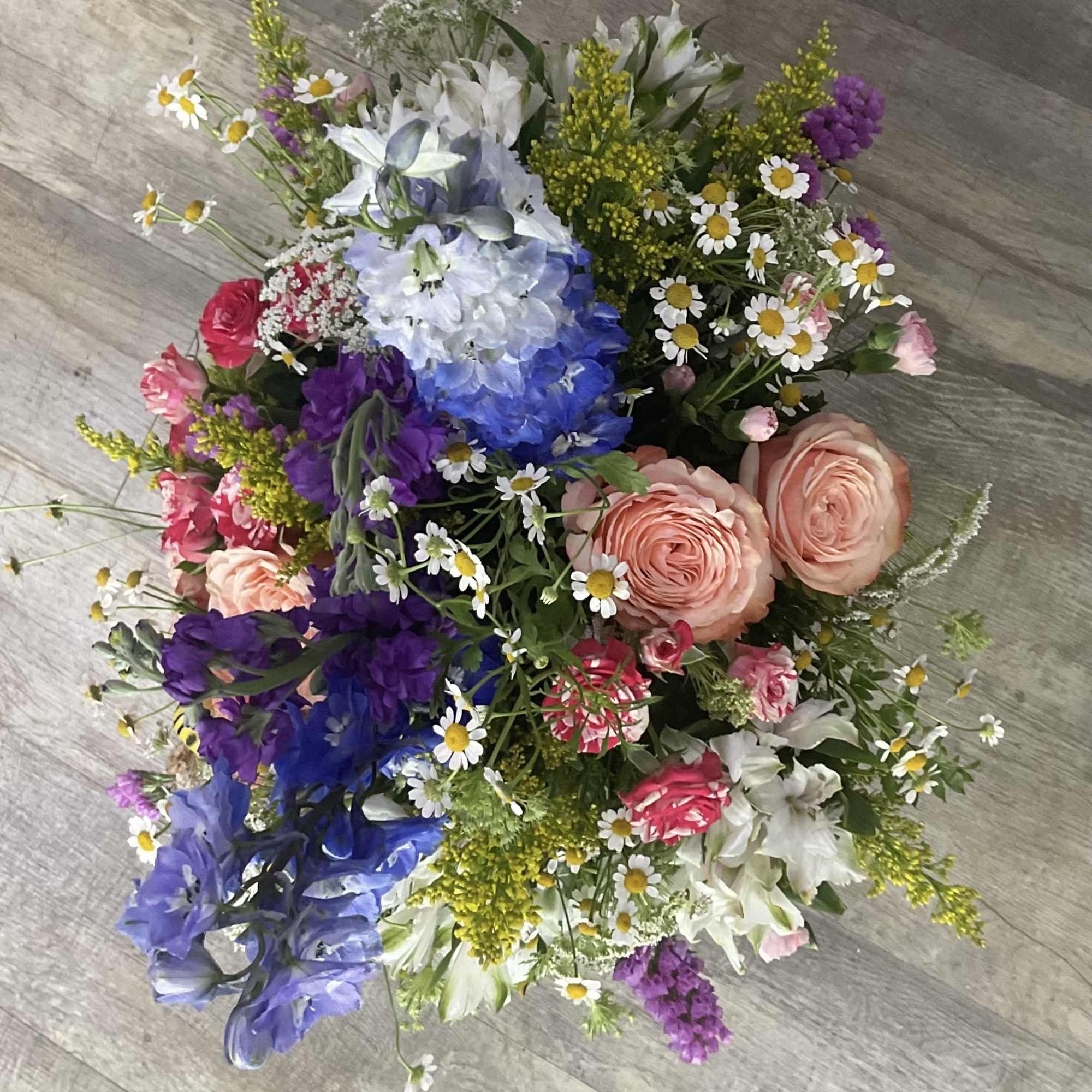 Celebrate with our charming Fluttering Wildflower garden arrangement from Aspen Tower Florist, photo 2 of 3