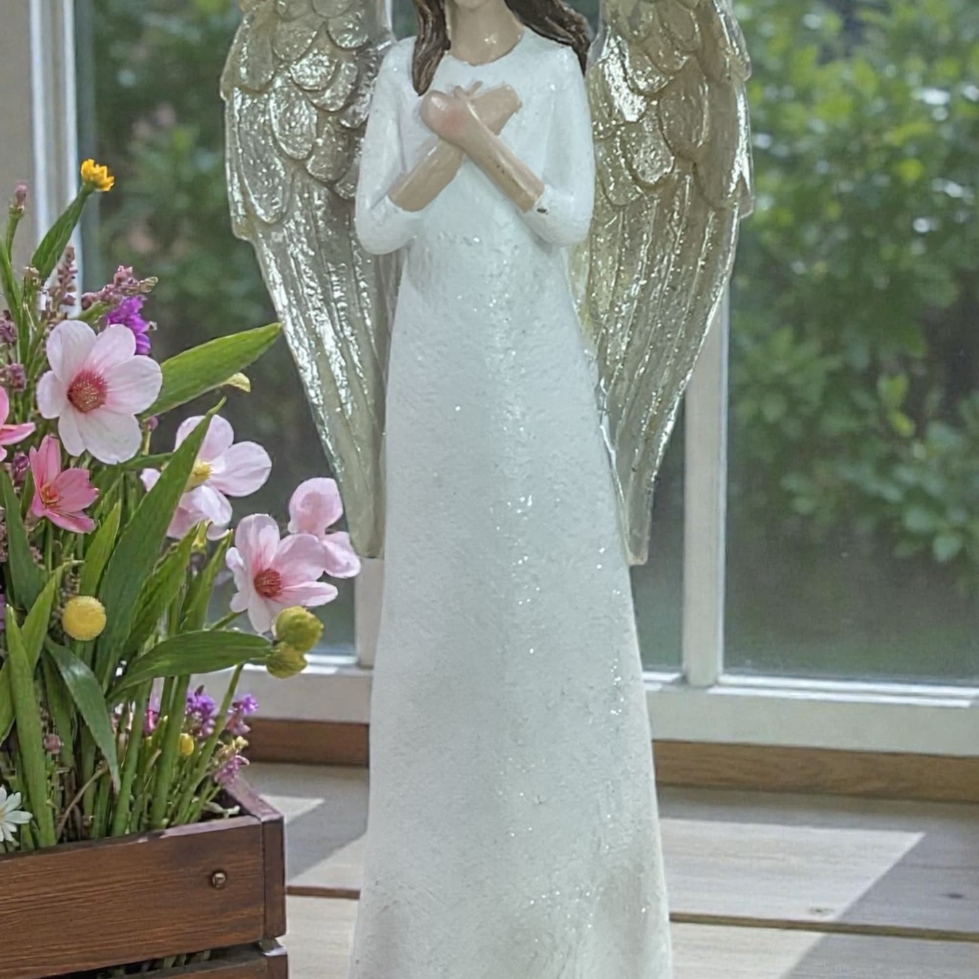 With All My Heart Angel Figurine is a beautiful keepsake that celebrates