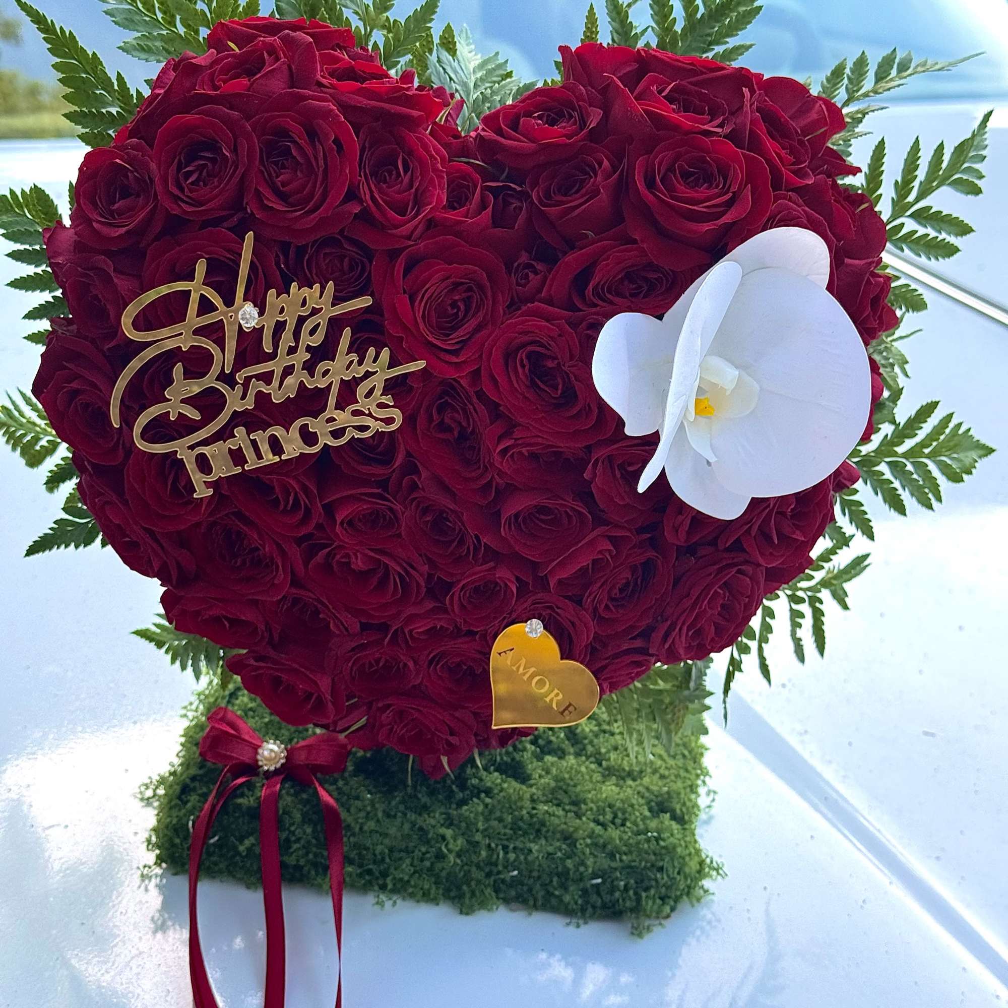A romantic 3D heart-shaped floral sculpture designed to make a bold and