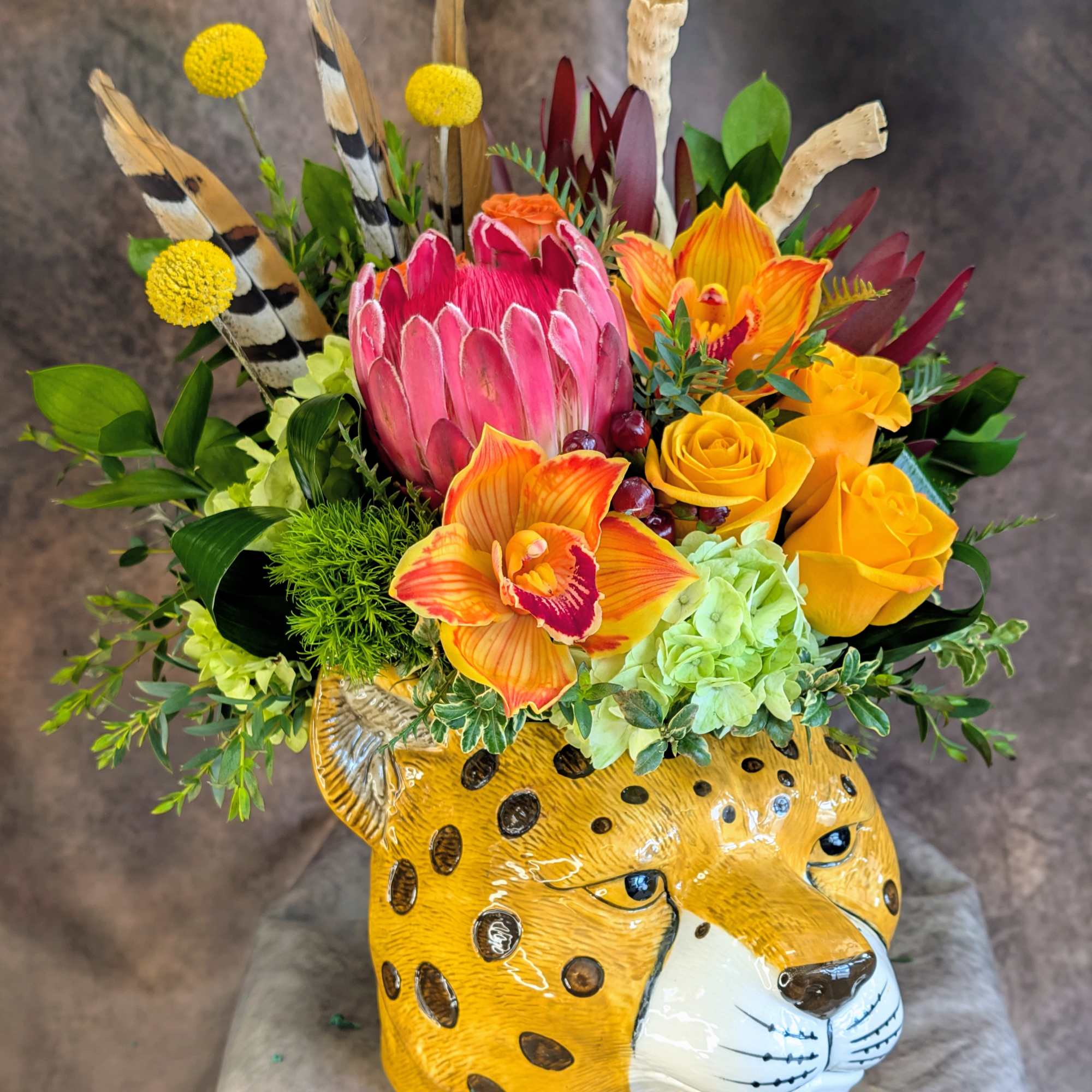 Bold. Wild. Unapologetically beautiful.

Untamed is a striking, safari-inspired floral design created for, photo 2 of 2