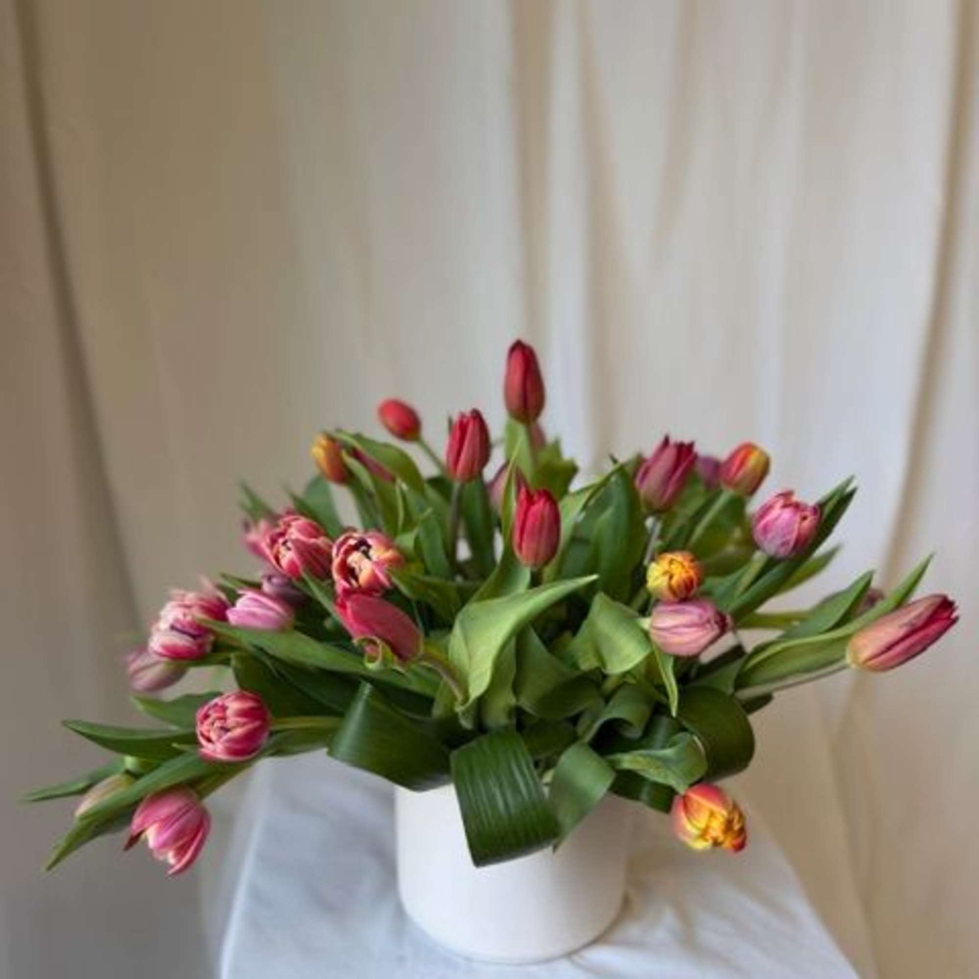 Bring a piece of European flair with stunning Dutch tulips. Set in