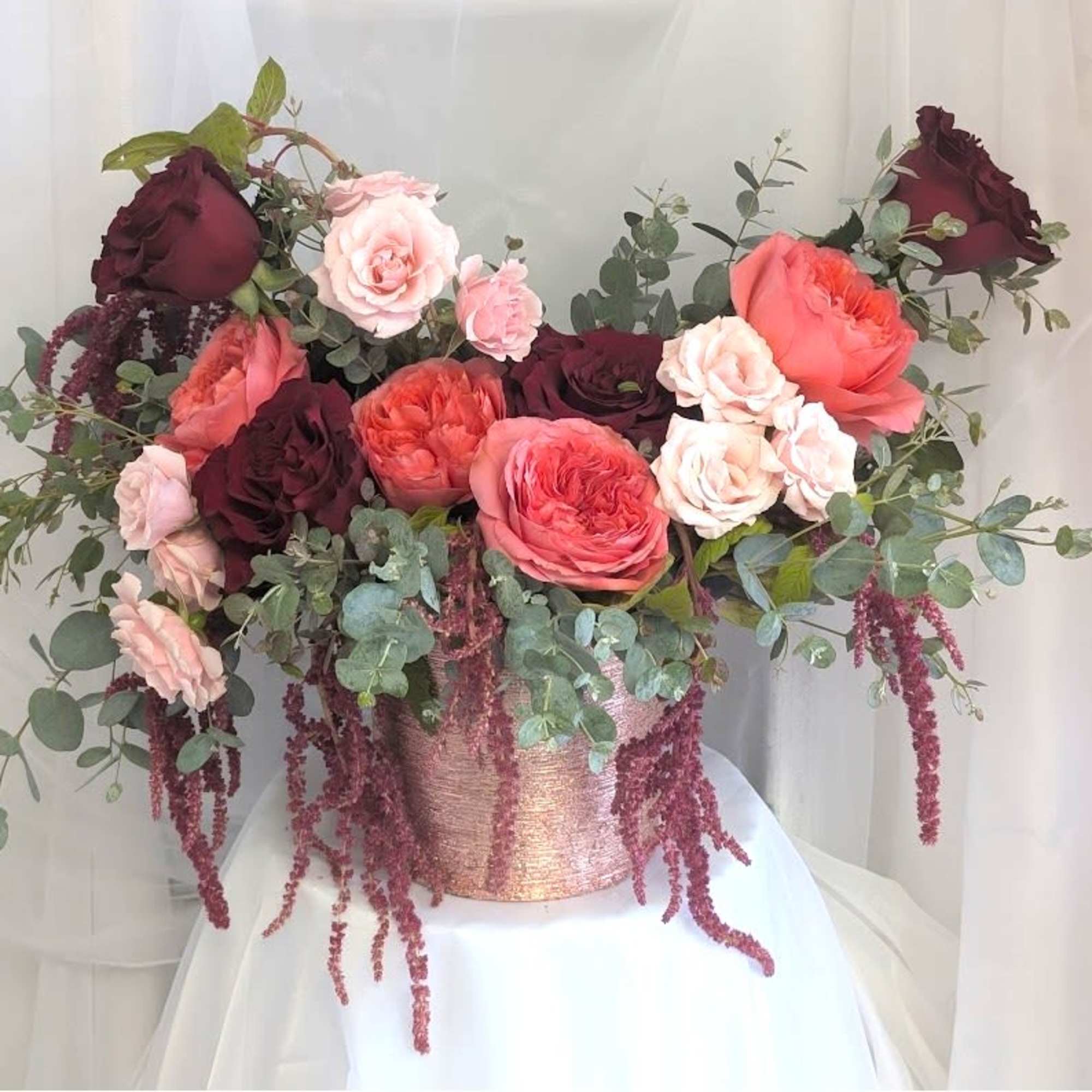 A modern one-sided arrangement with a combination of Garden Roses, Spray Roses, photo 3 of 3