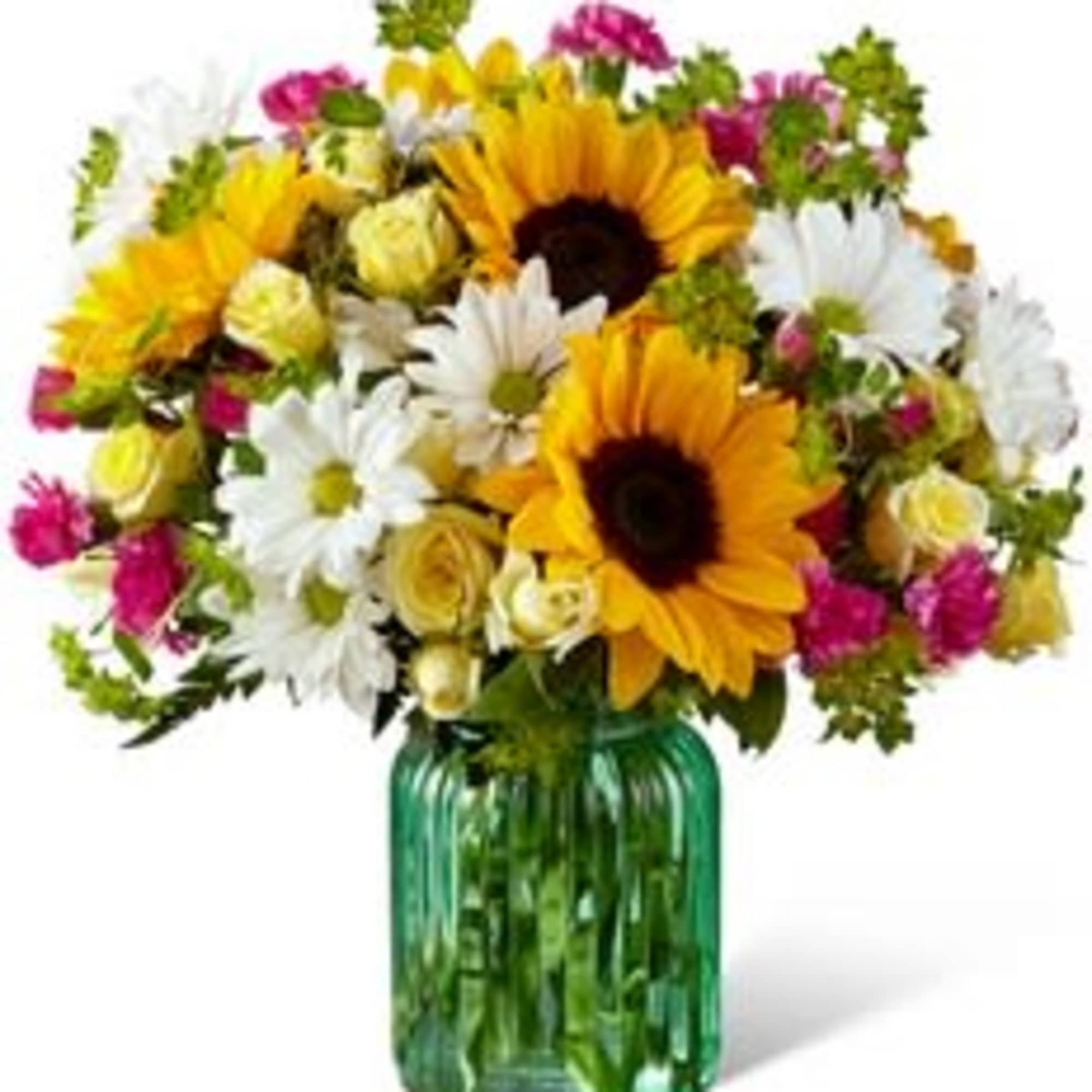 Sunflowers, white daisies, and pink flowers in a green glass vase
