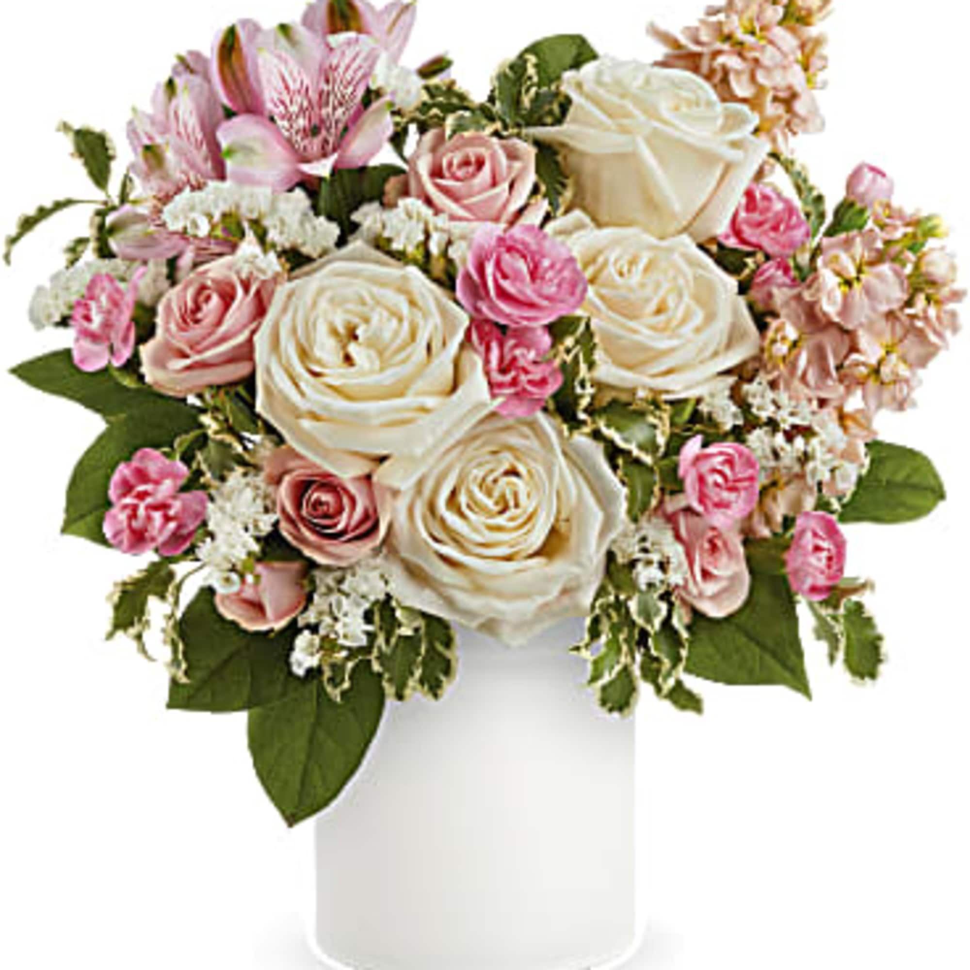 Pink and white roses with alstroemeria in a white vase