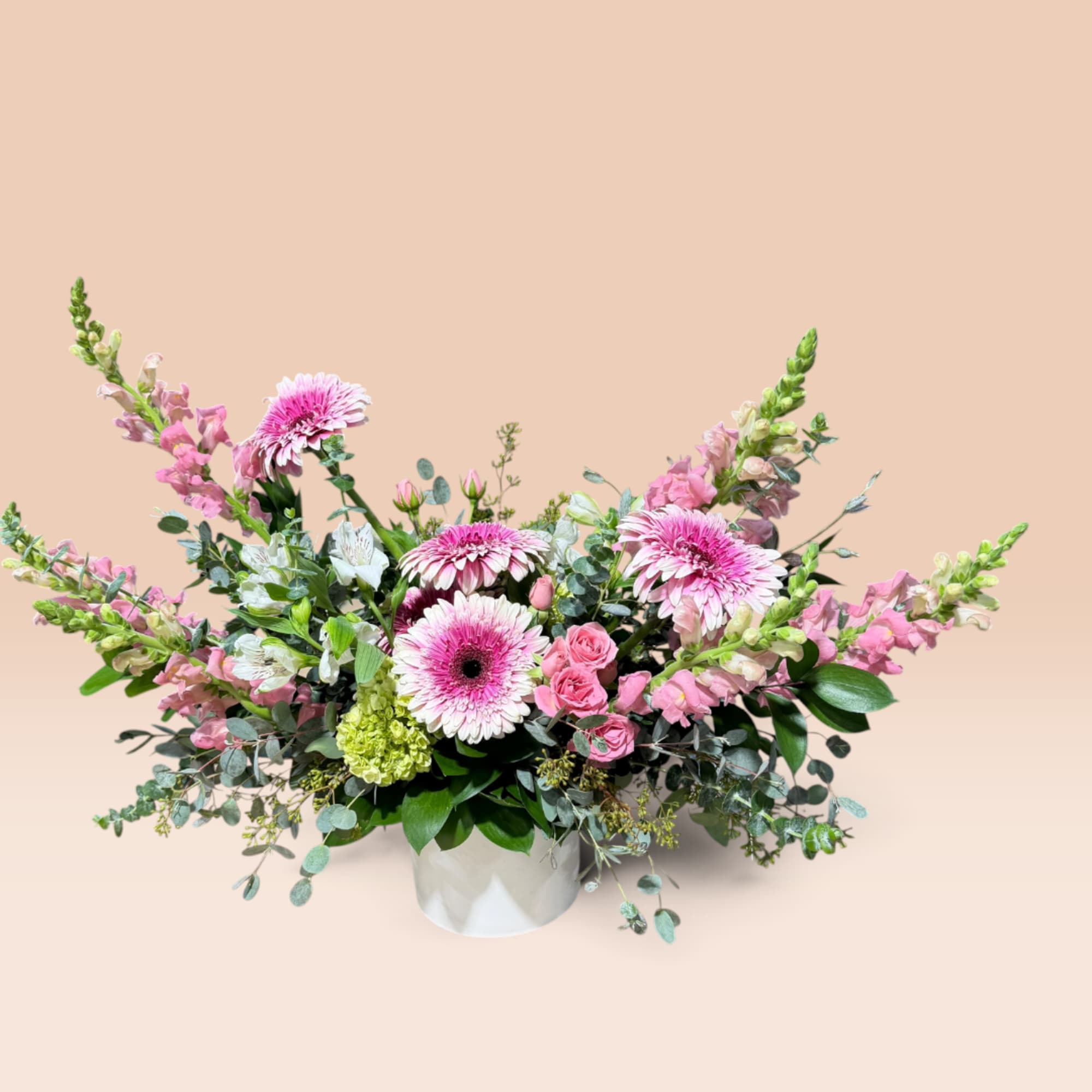 Pink and white mixed flower arrangement in a white vase, photo 6 of 7