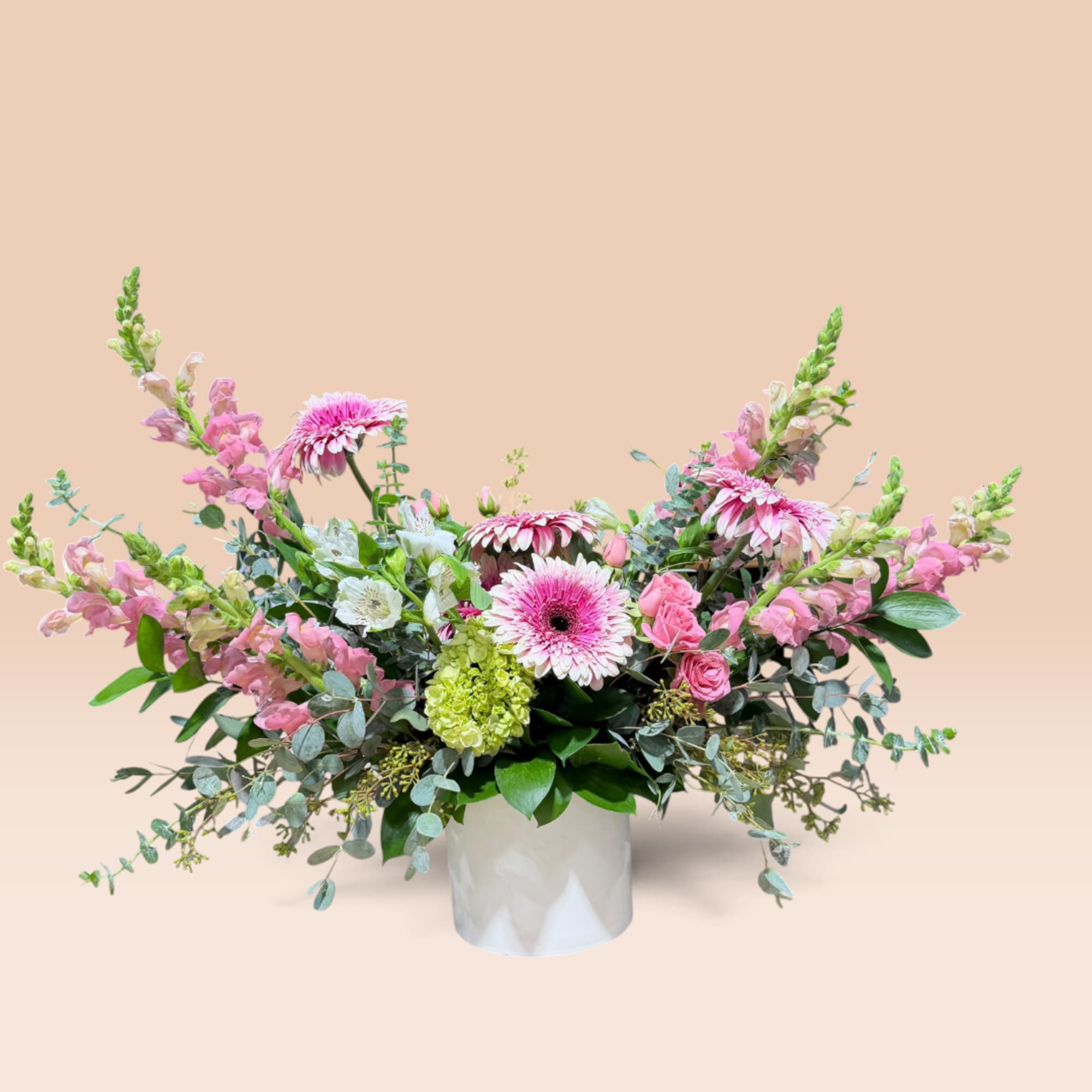 Pink and white mixed flower arrangement in a white vase, photo 5 of 7