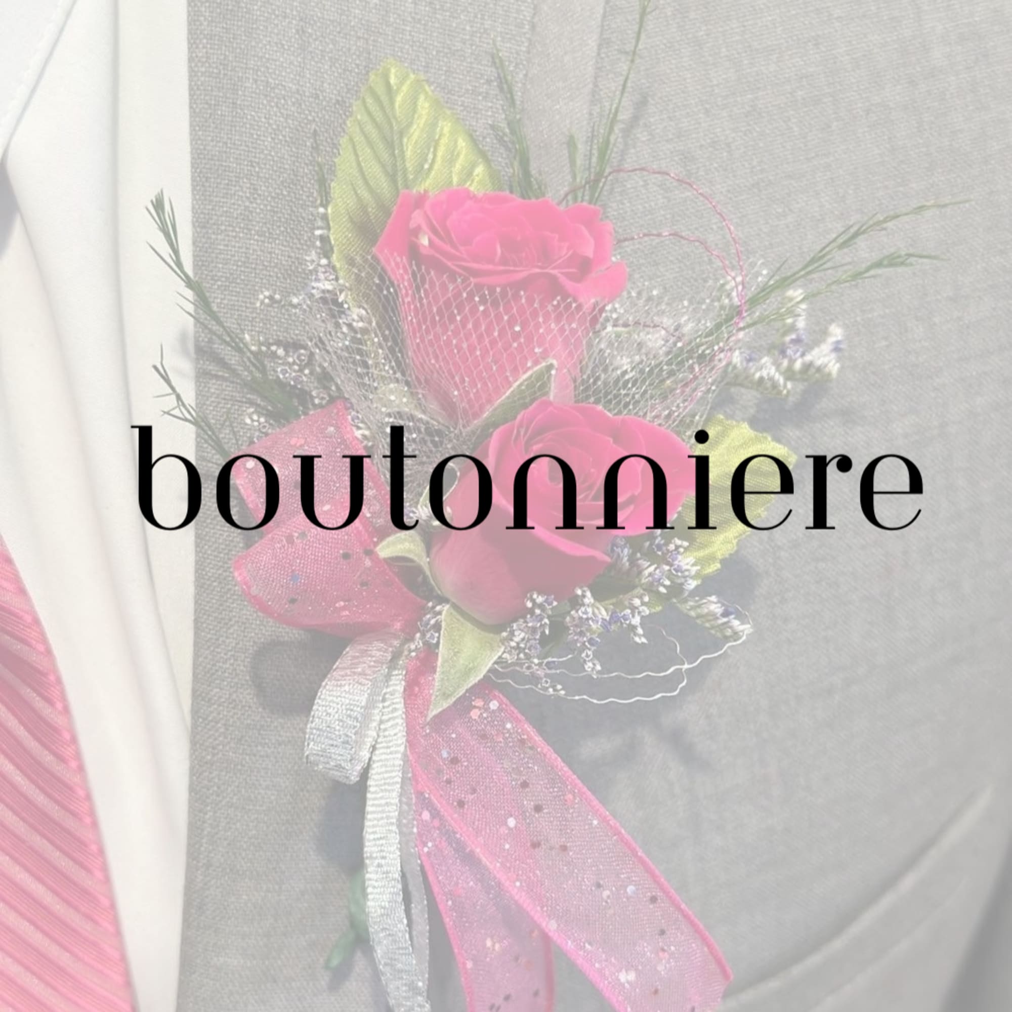 Pink rose boutonniere with ribbon and netting