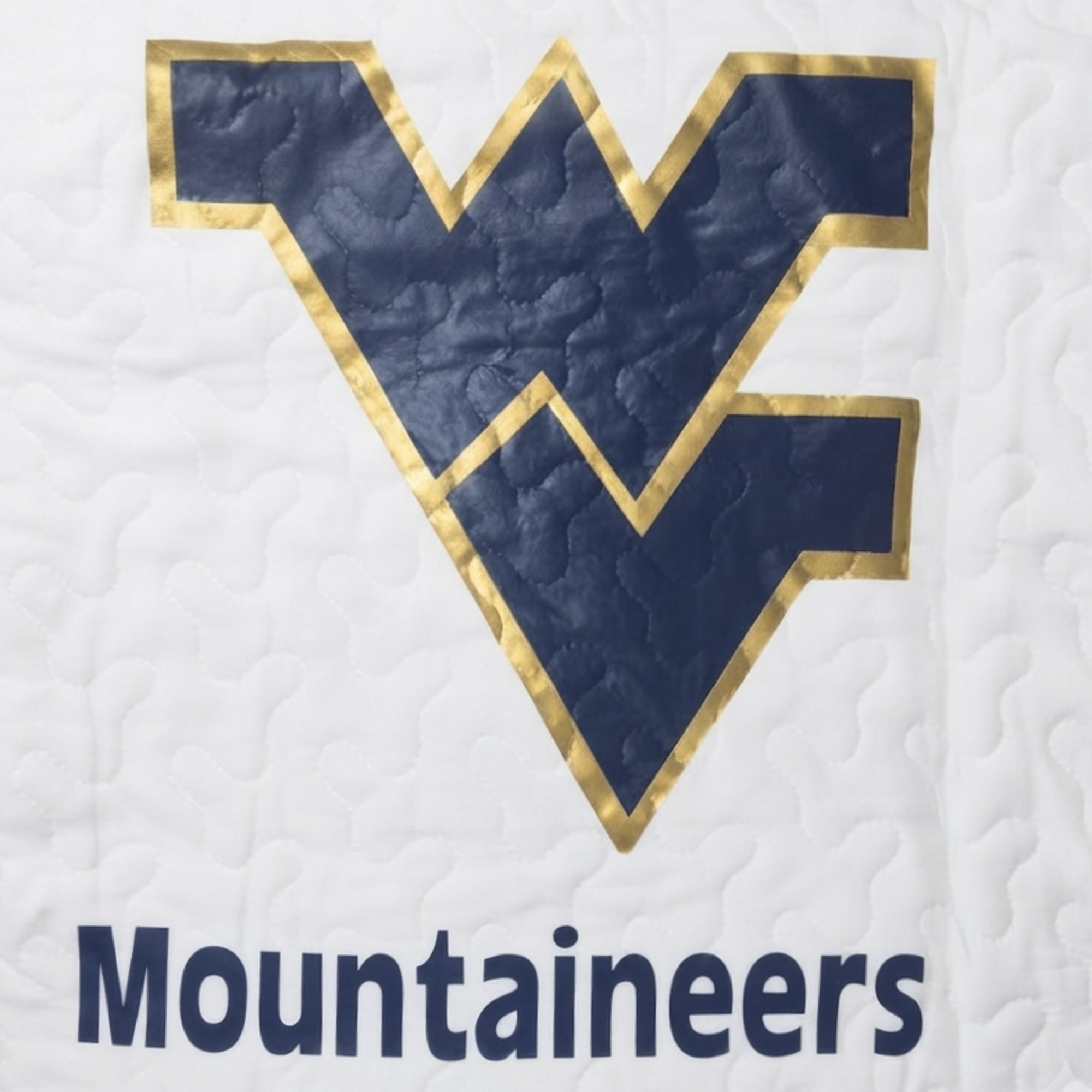 Blue and gold Mountaineers logo on a white quilted background