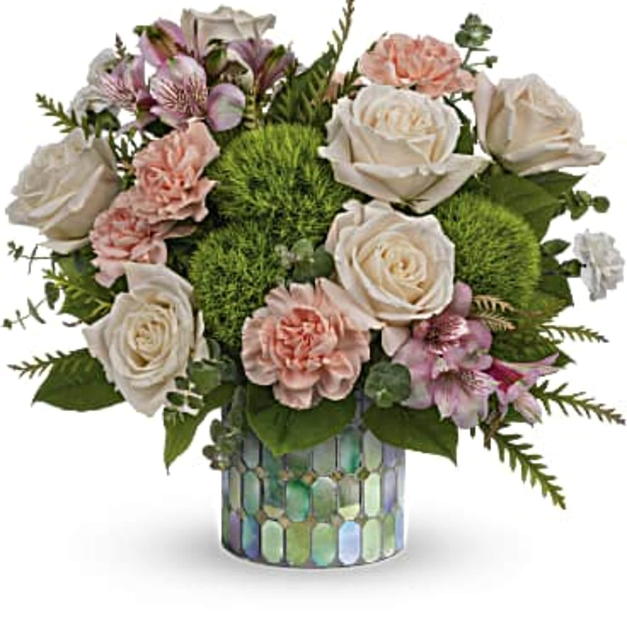 Wild and whimsical, this enchanting bouquet of cr&Atilde;&uml;me roses and peachy blooms