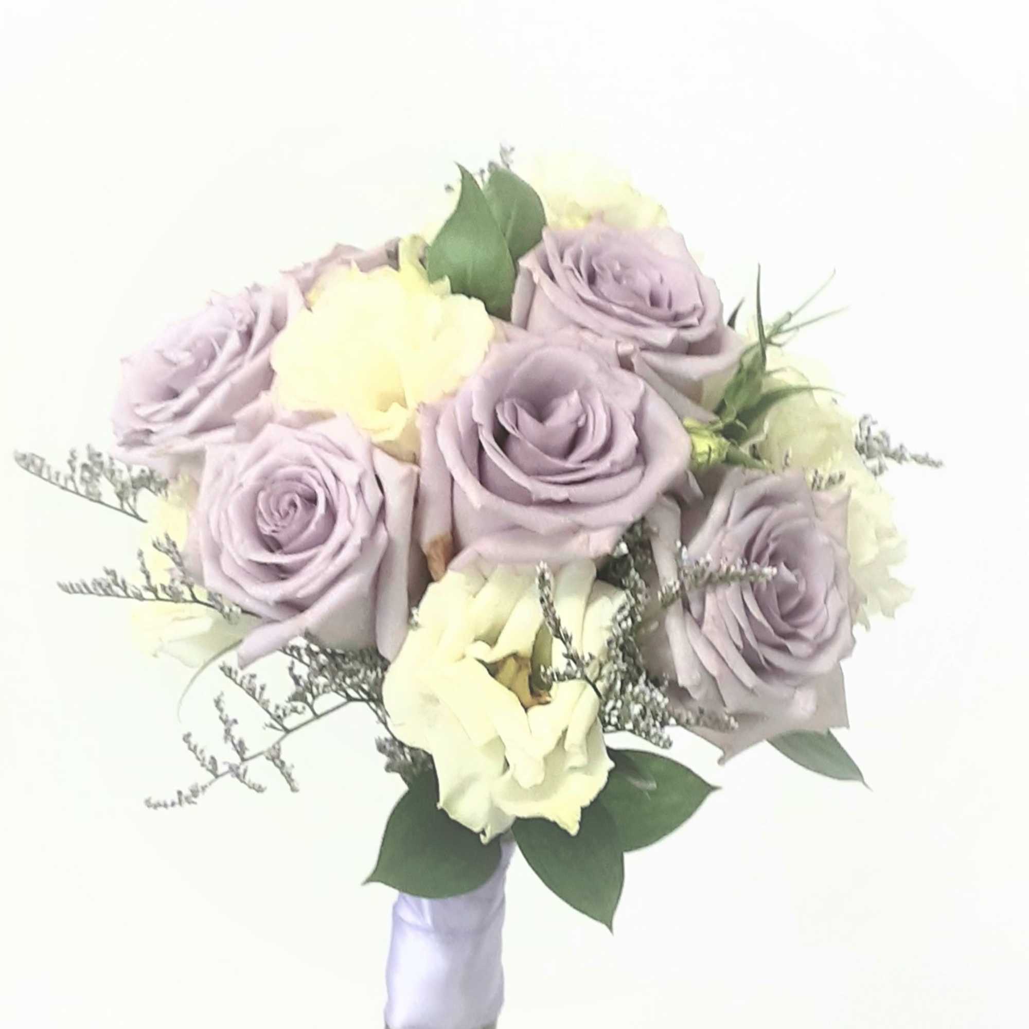 A classic rose and baby's breath bouquet hand tied with ribbon. The