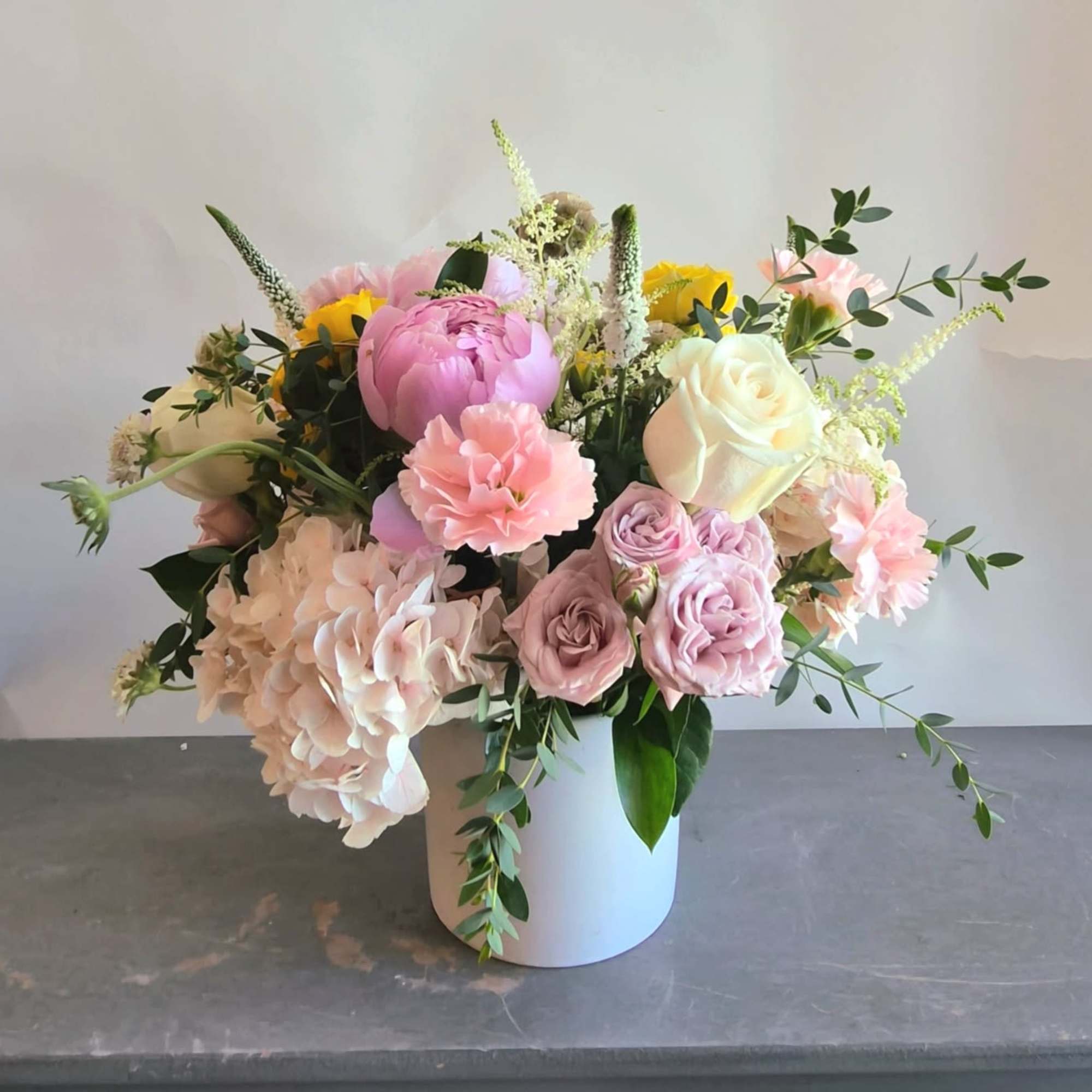 A mix of summer flowers surrounding gorgeous blooming peonies., photo 3 of 3