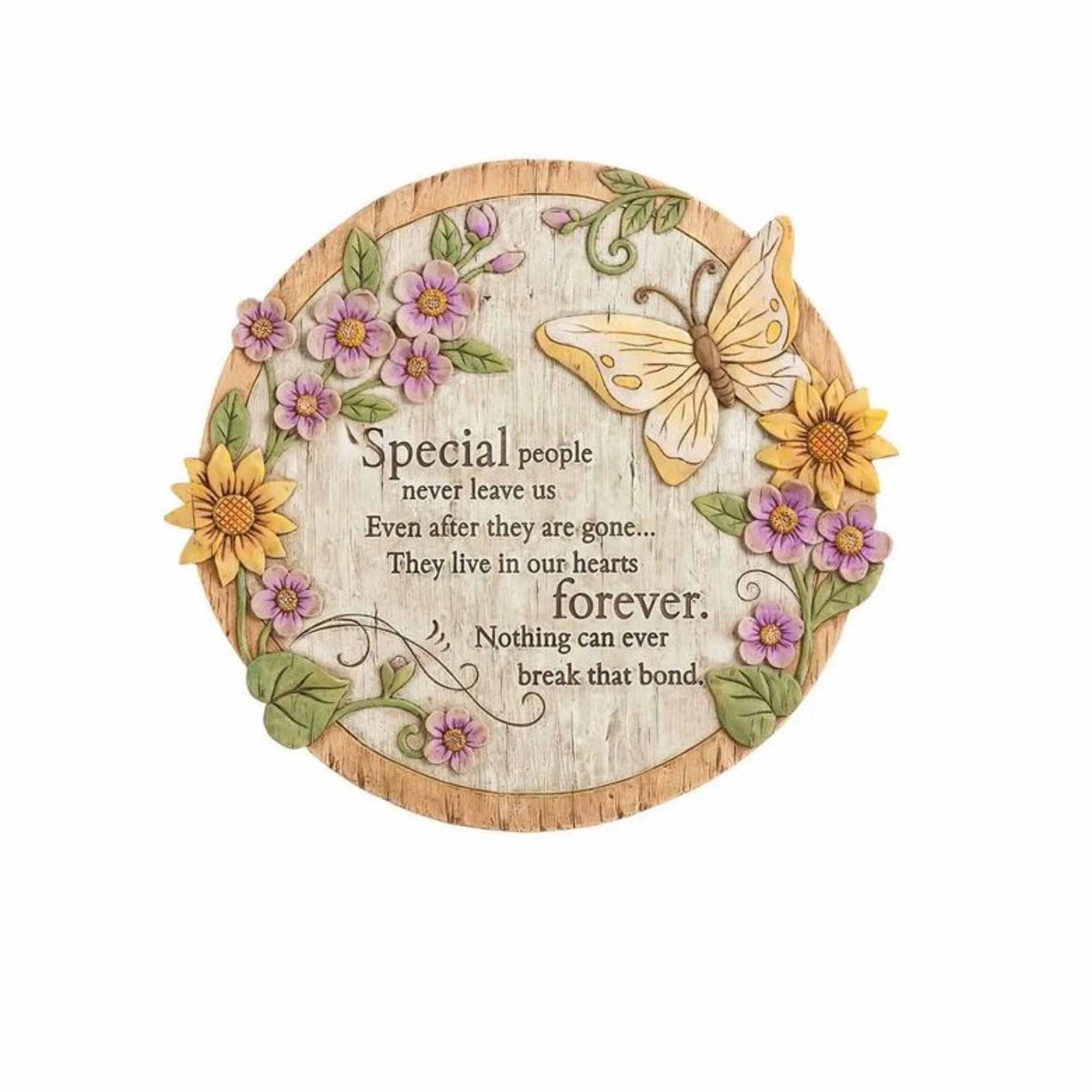 Round wooden memorial plaque with flowers, butterfly, and sympathy text