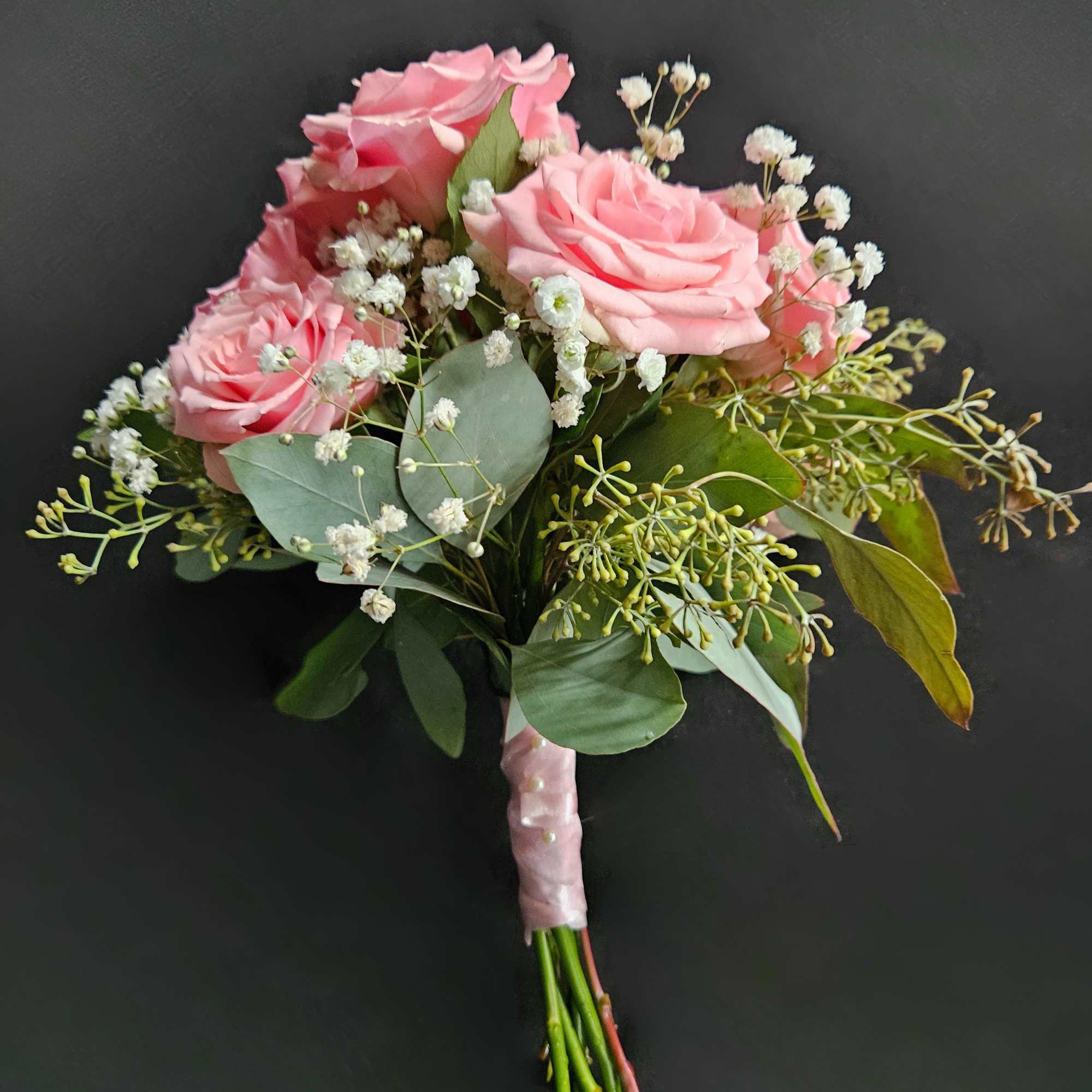 A classic 5 stem spray rose bouquet hand-tied with satin ribbon that, photo 2 of 2