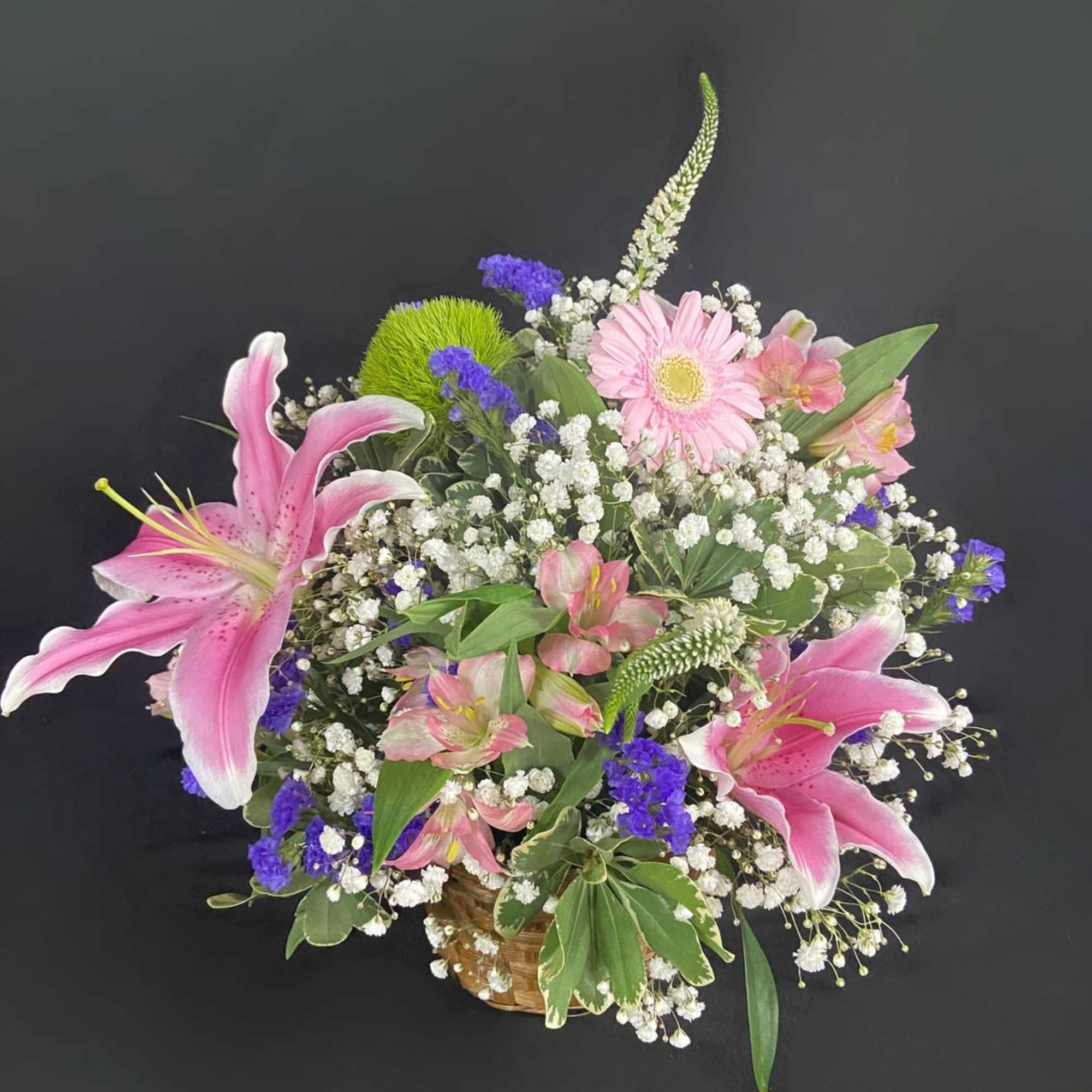 A delightful basket filled with fragrant flowers including Stargazer Lilies, Alstroemeria, Gerbera, photo 2 of 2