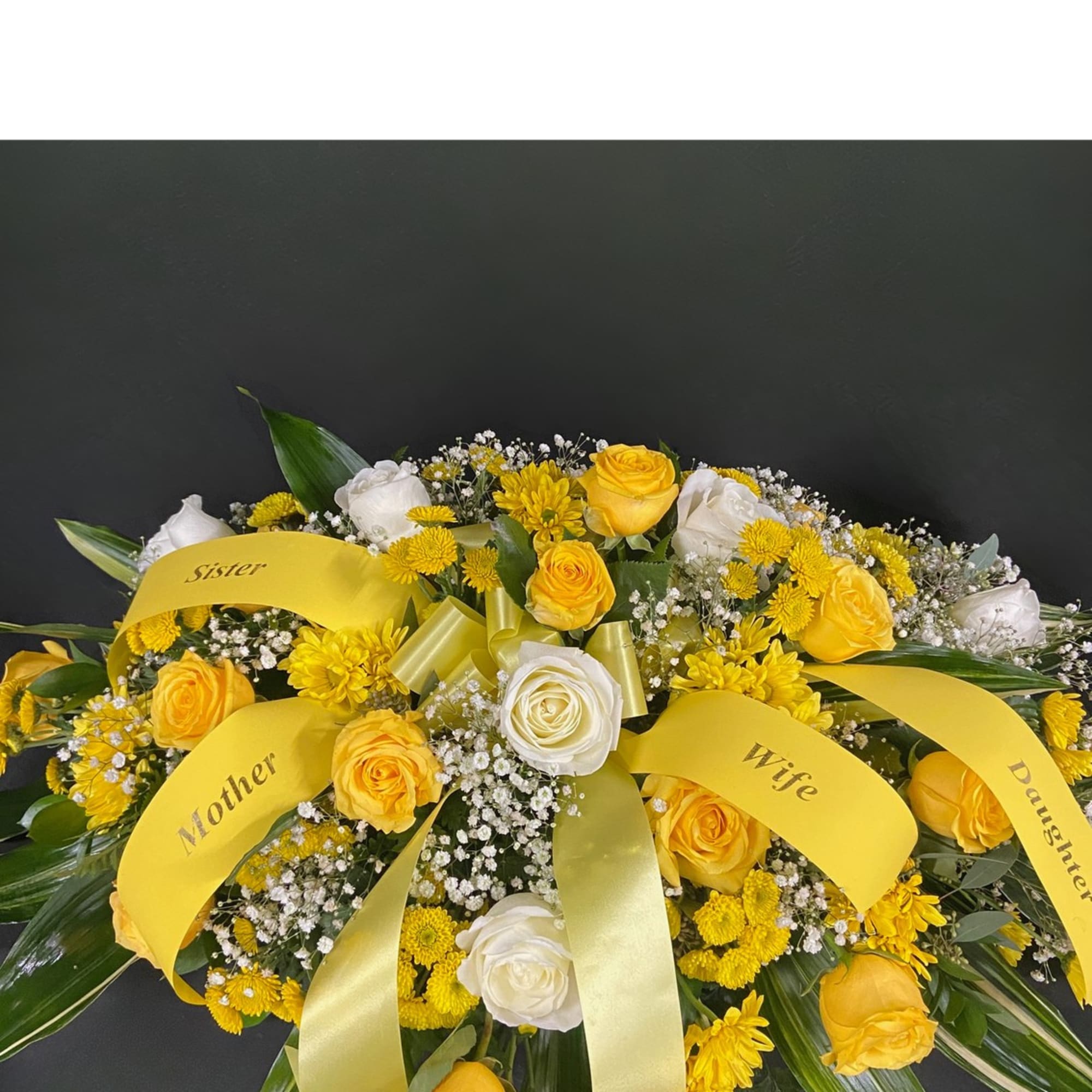 Golden yellow roses become even more striking against a backdrop of elegant, photo 2 of 2