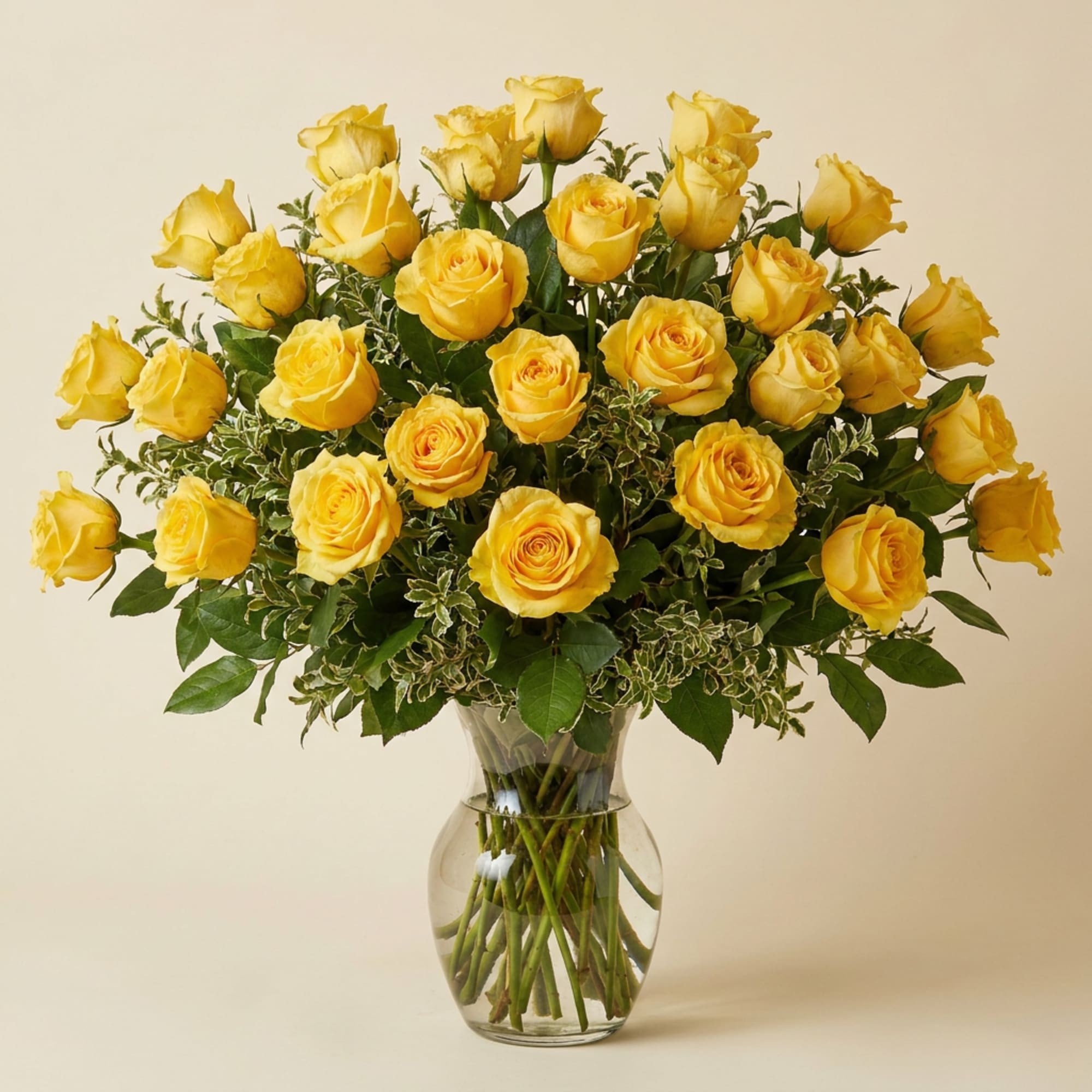 Bouquet of yellow roses in a clear glass vase