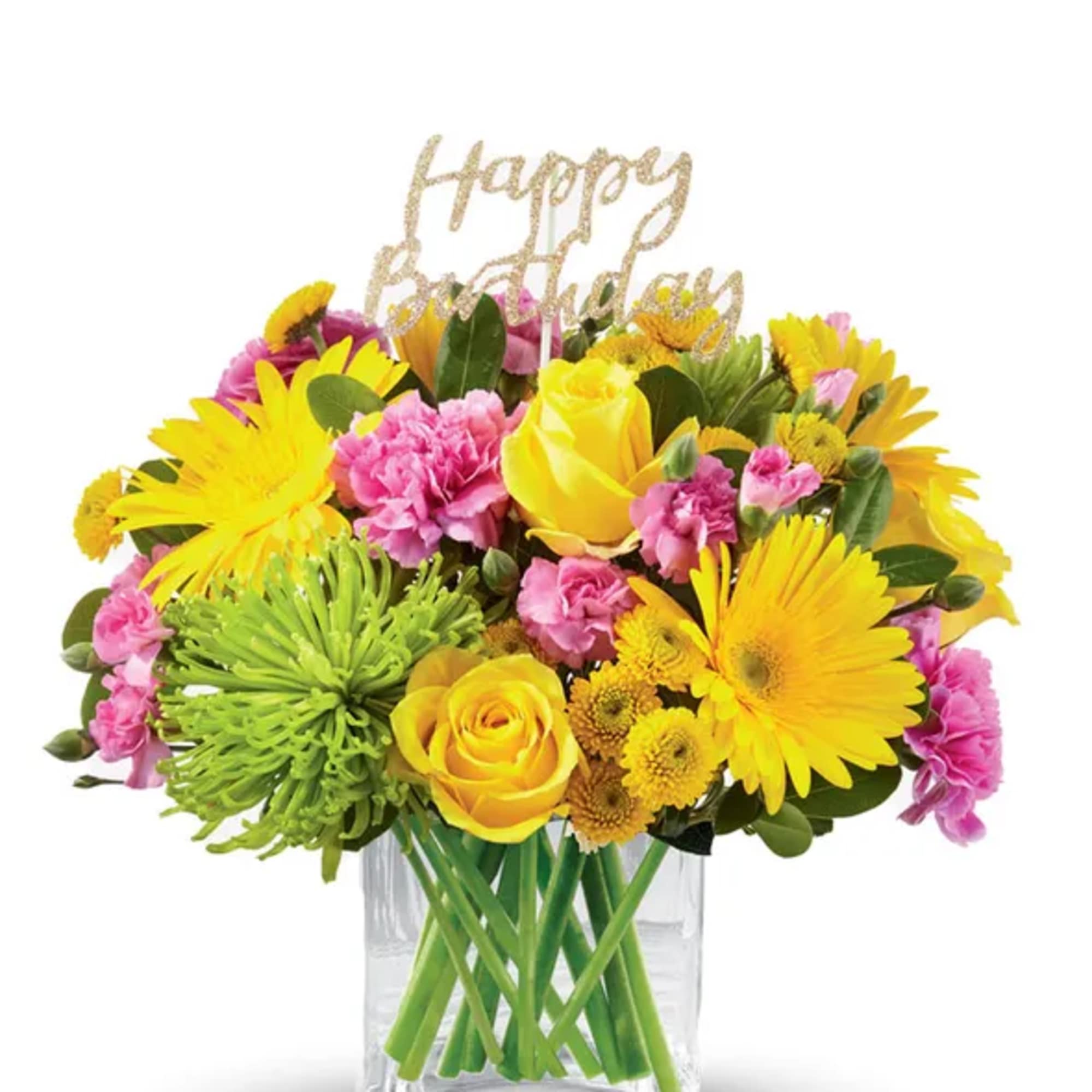 Yellow and pink mixed bouquet in a clear glass vase with a Happy Birthday topper