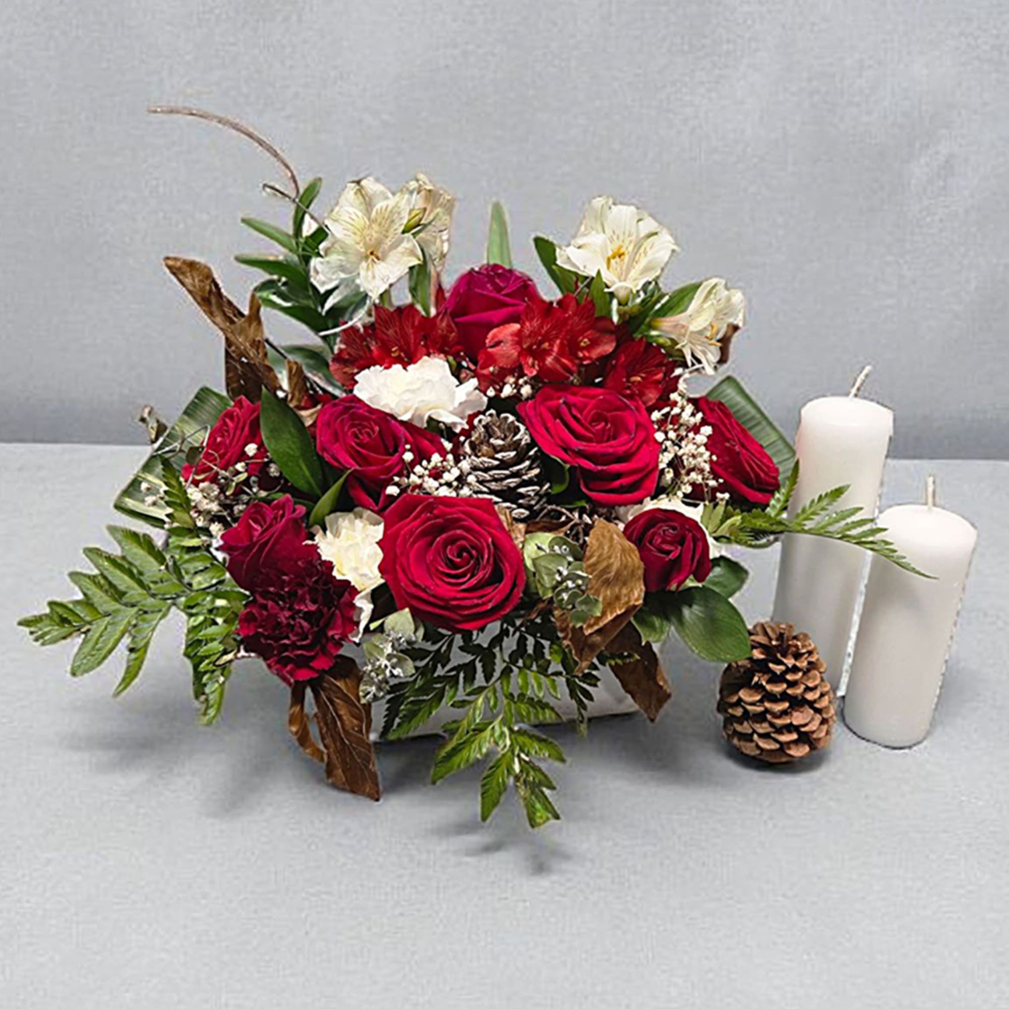 This arrangement sings with joy with is beautiful display of red roses