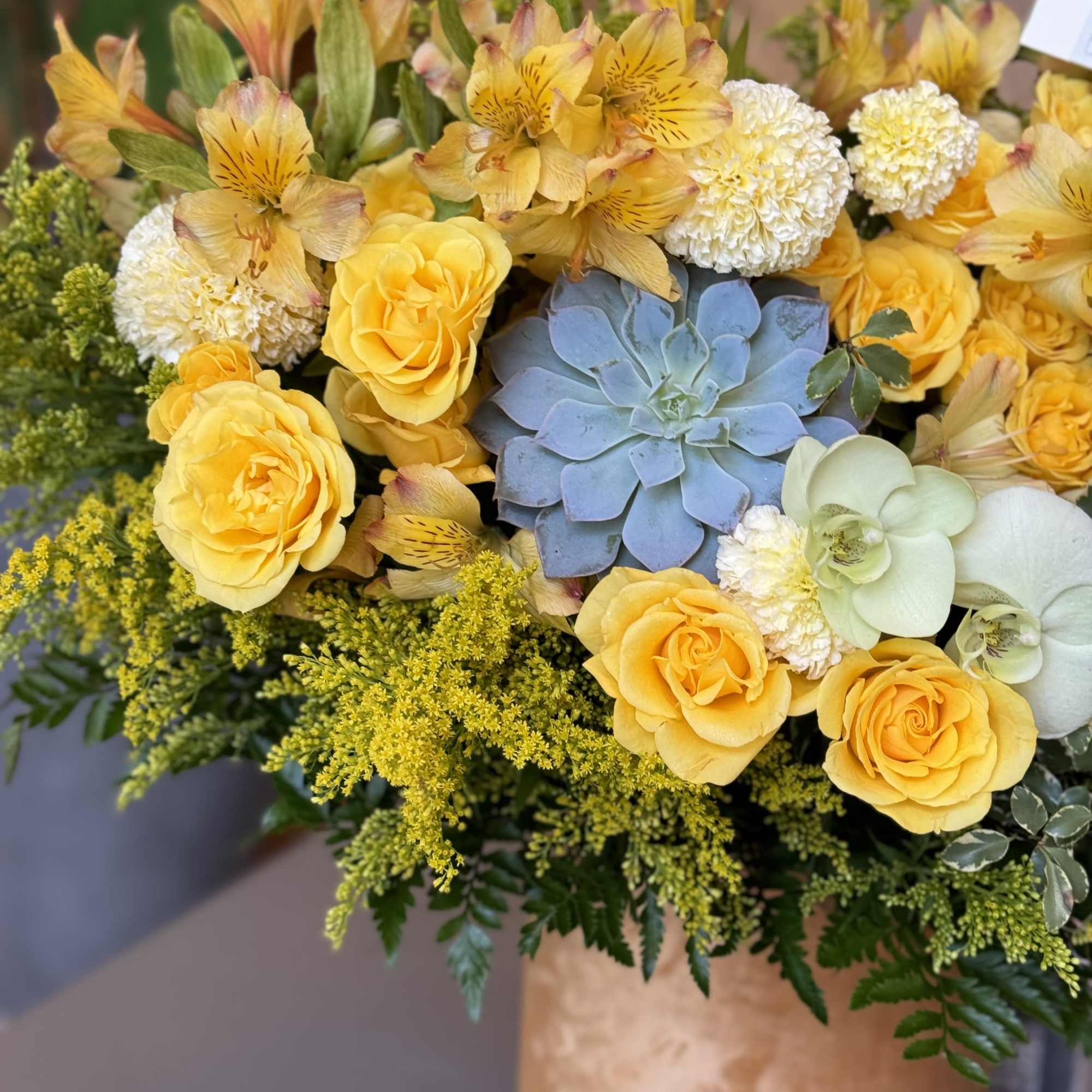 Yellow roses and alstroemeria with a blue succulent in a vase, photo 17 of 17