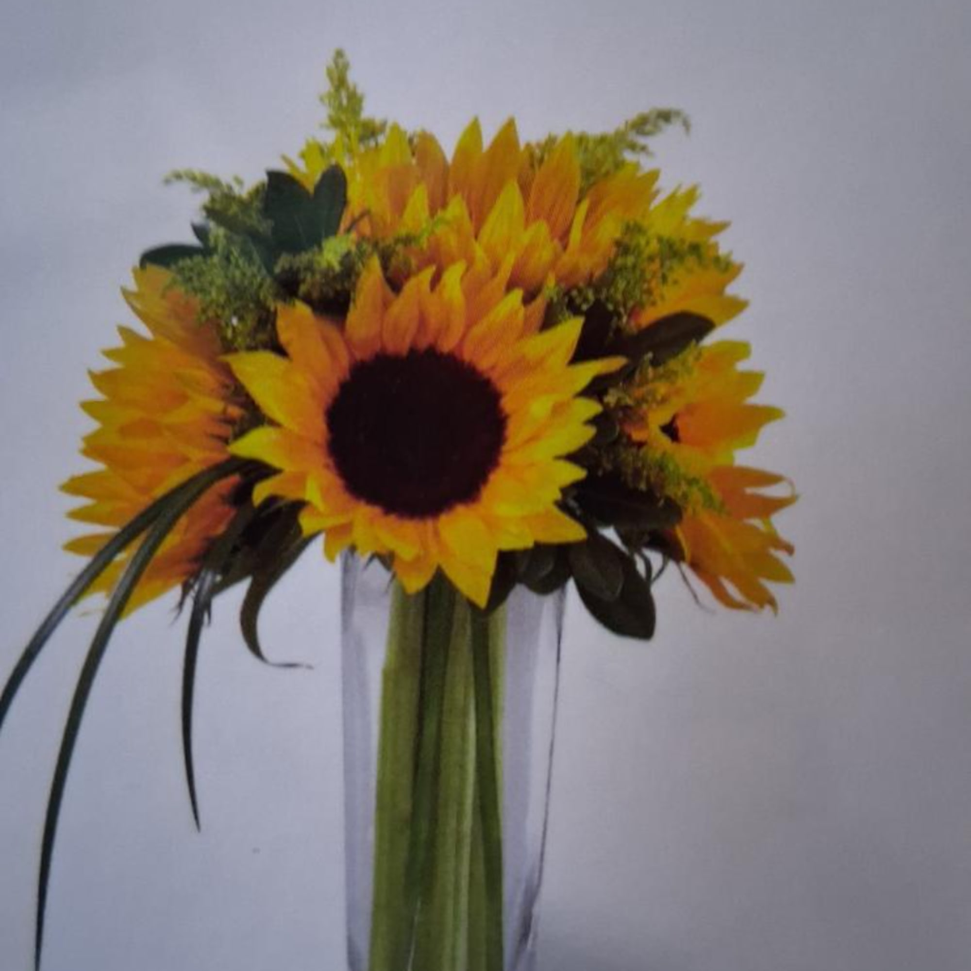 Sunflower bouquet in a clear glass vase