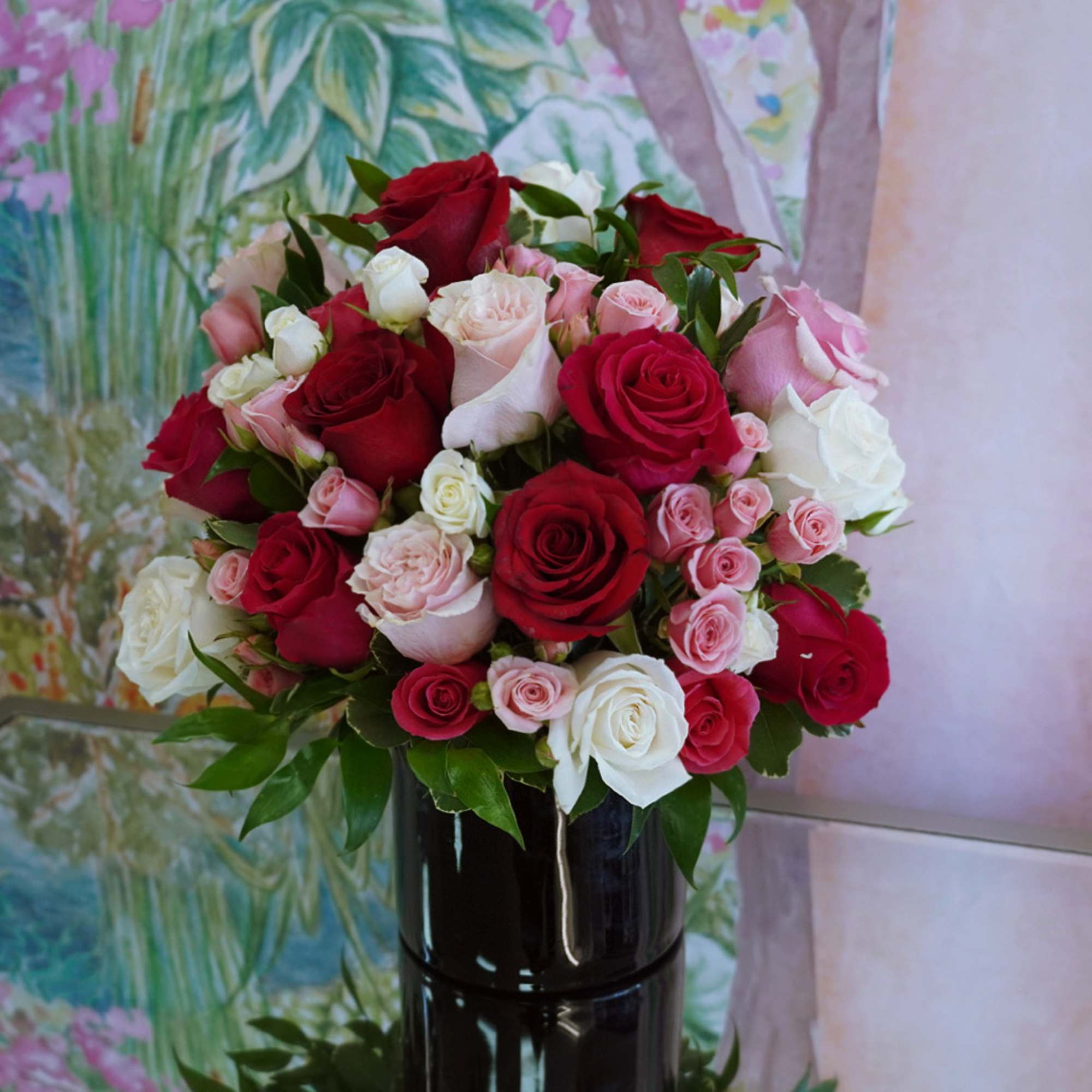 Bouquet of red, pink, and white roses in a black vase, photo 3 of 3