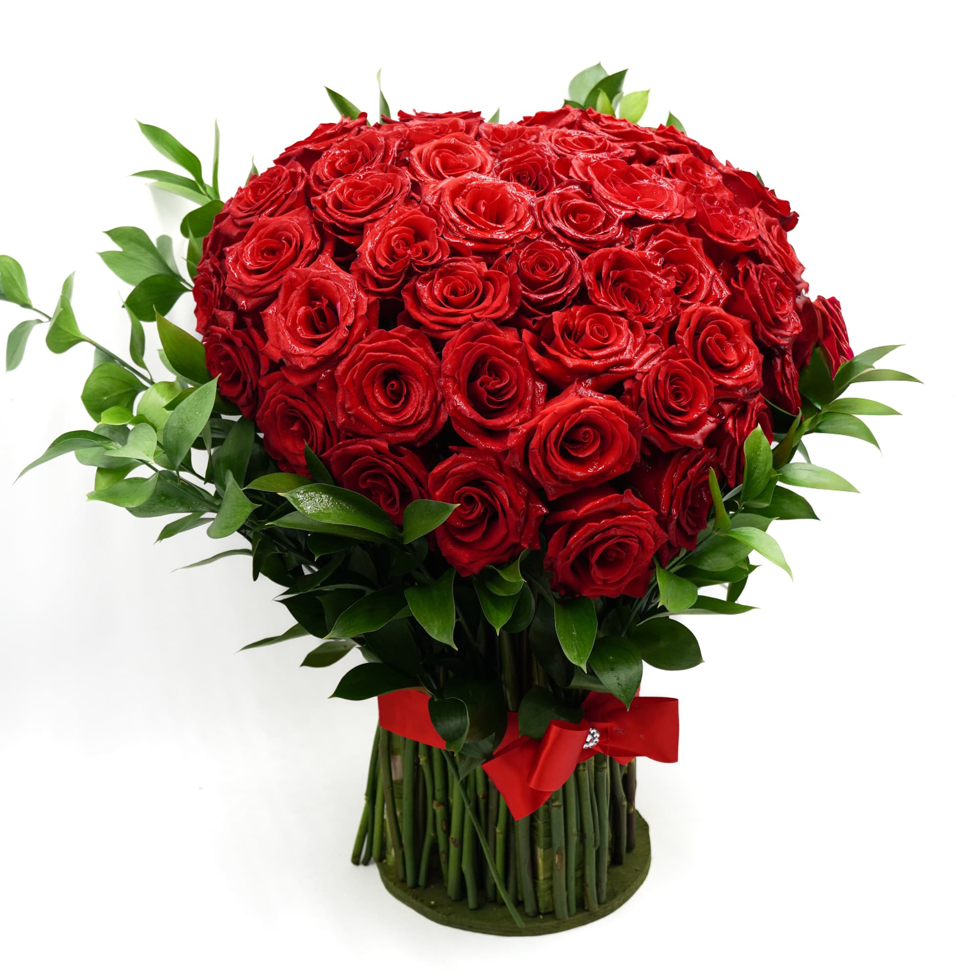 A breathtaking display of luxurious red roses arranged in a full, heart-shaped, photo 2 of 2