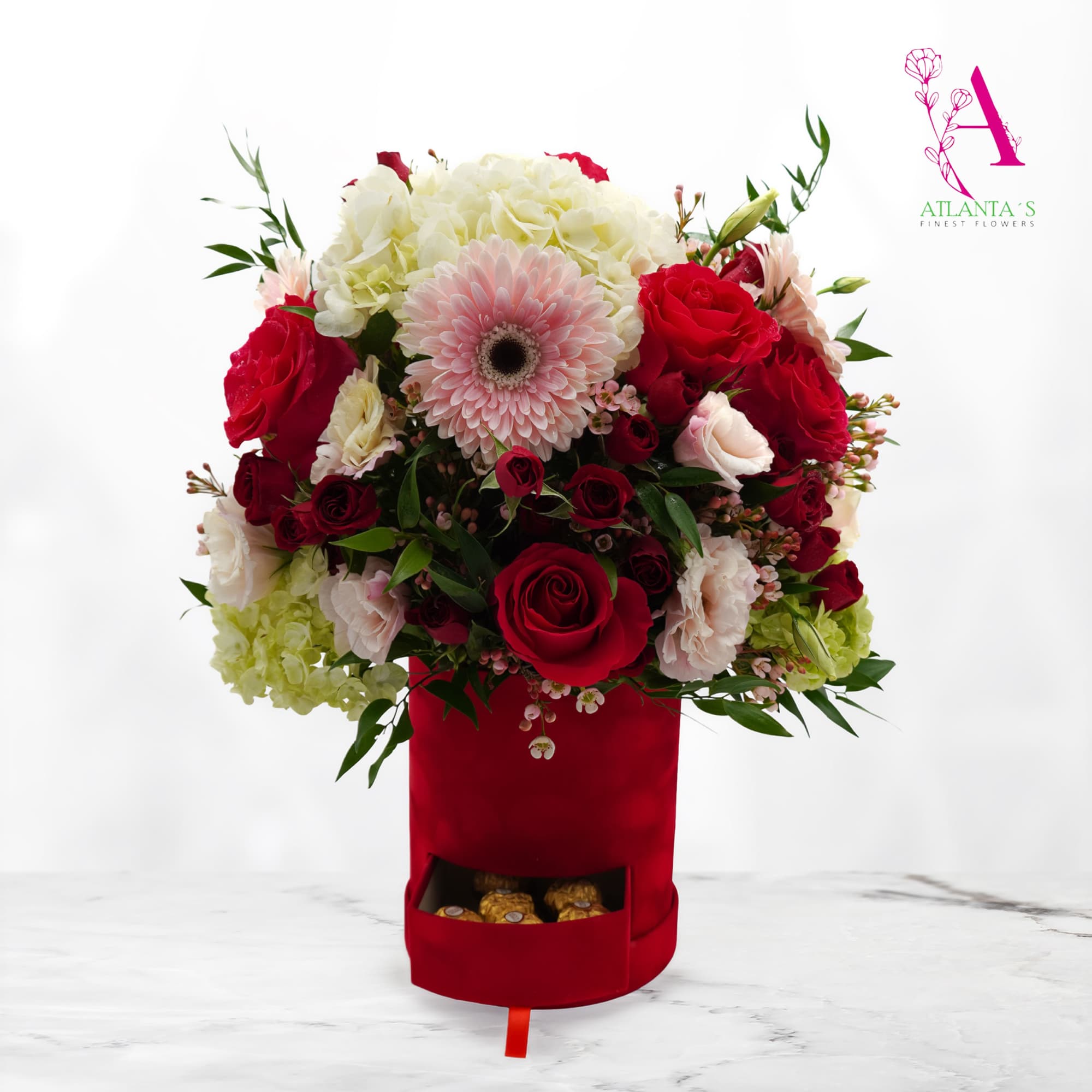 A romantic arrangement of red roses, blush blooms, and white hydrangea with, photo 2 of 2
