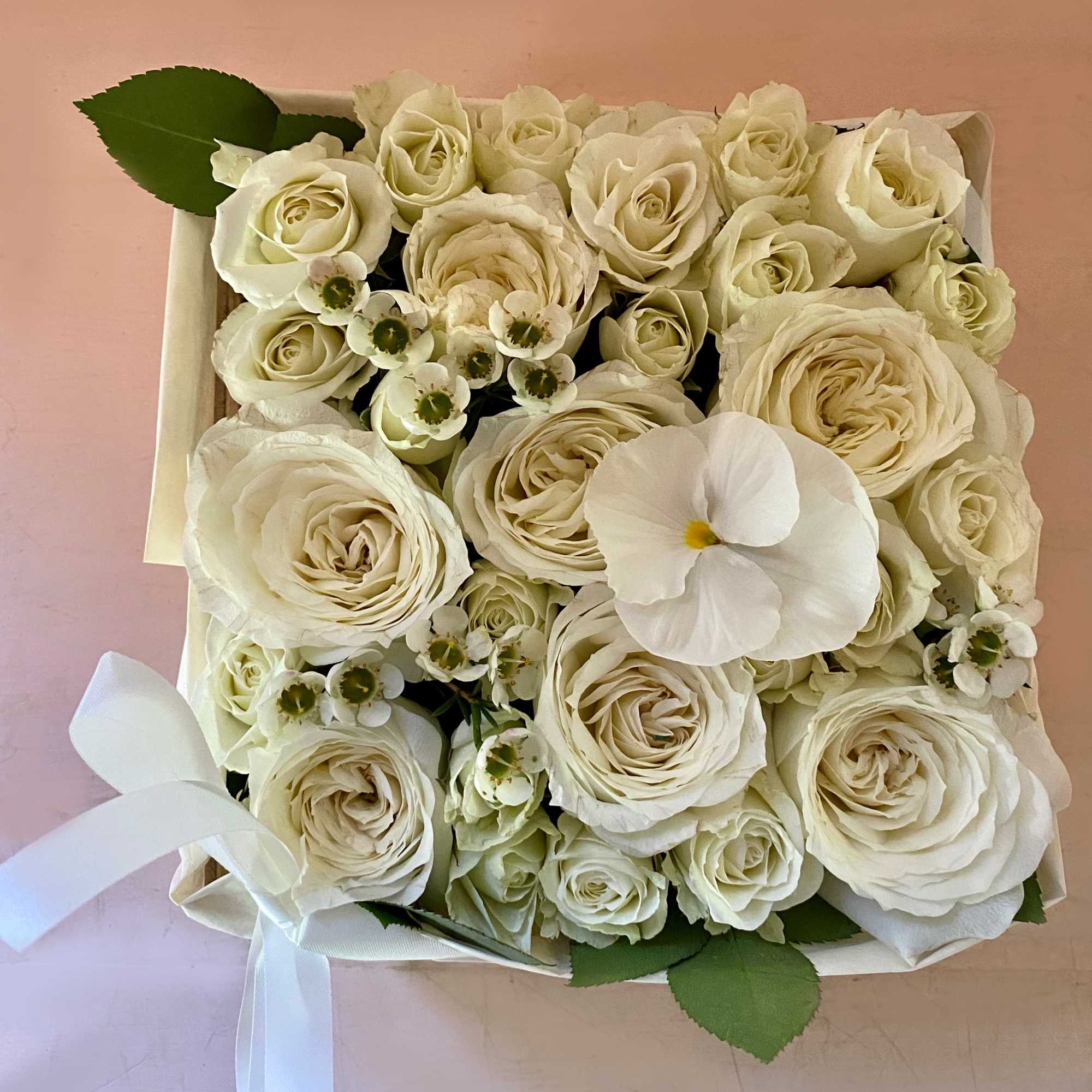 Beautiful blooming flower box full of fresh flowers in a white and, photo 4 of 4
