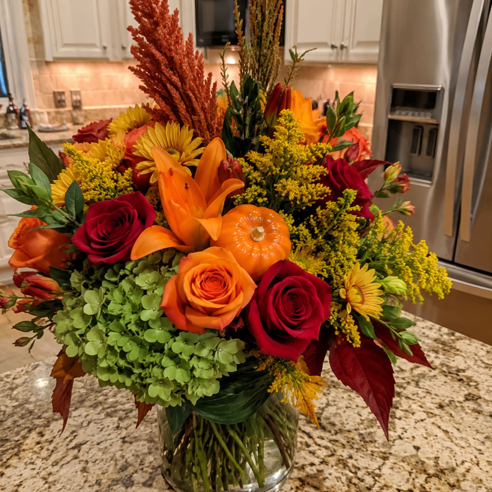 A bold burst of autumn color-this fall flower arrangement for Thanksgiving and